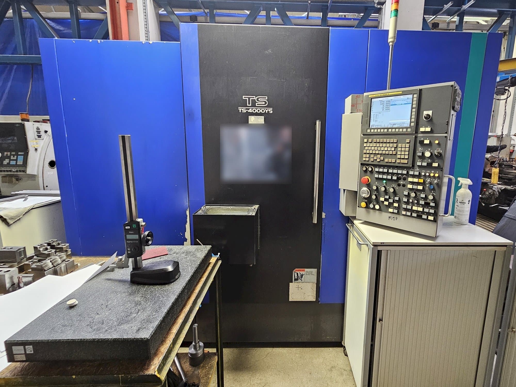 Koneen  Takisawa TS-4000YS etunäkymä