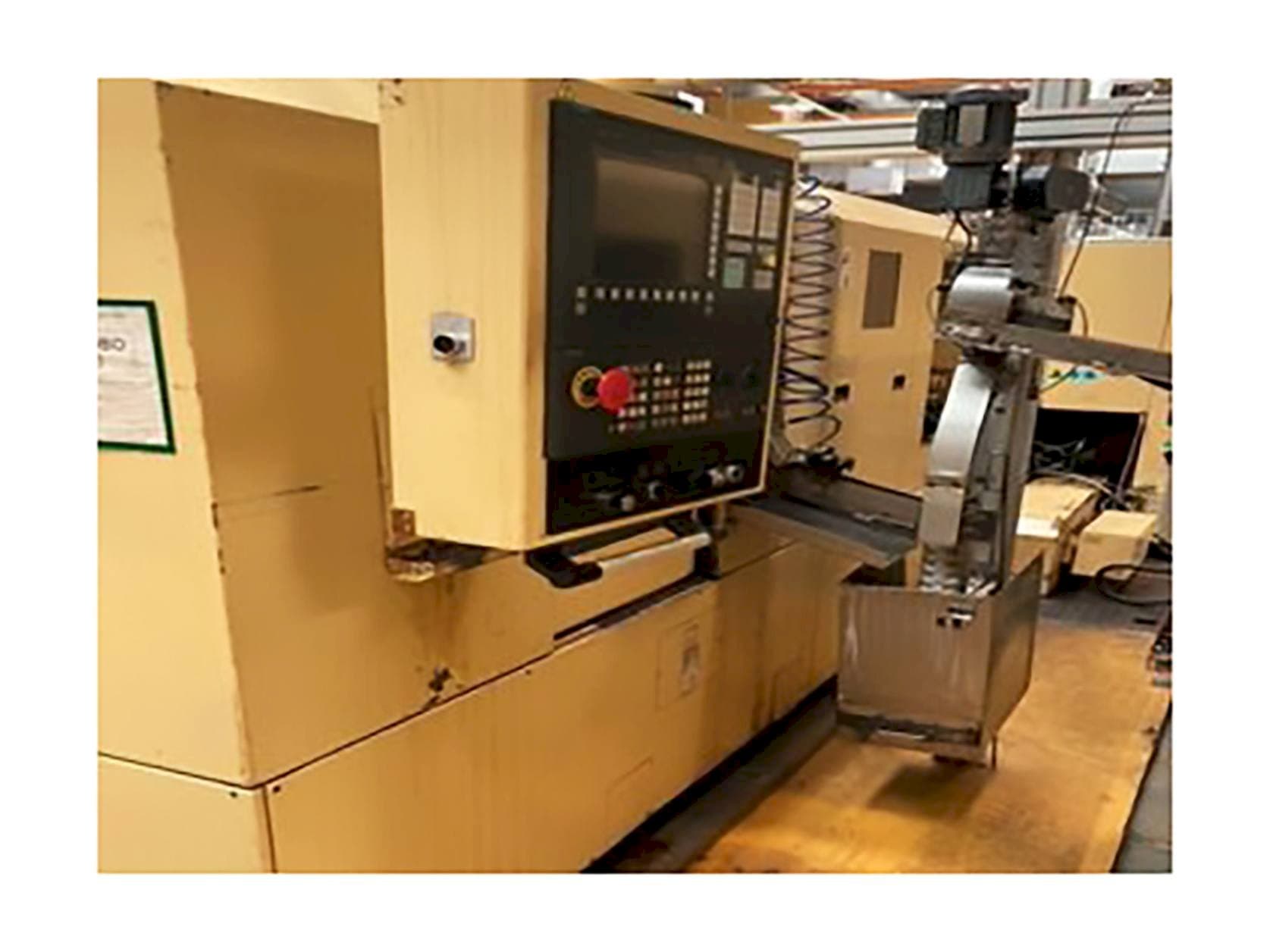 Koneen  TAJMAC-ZPS SAL 100/4 vasemman sivun näkymä