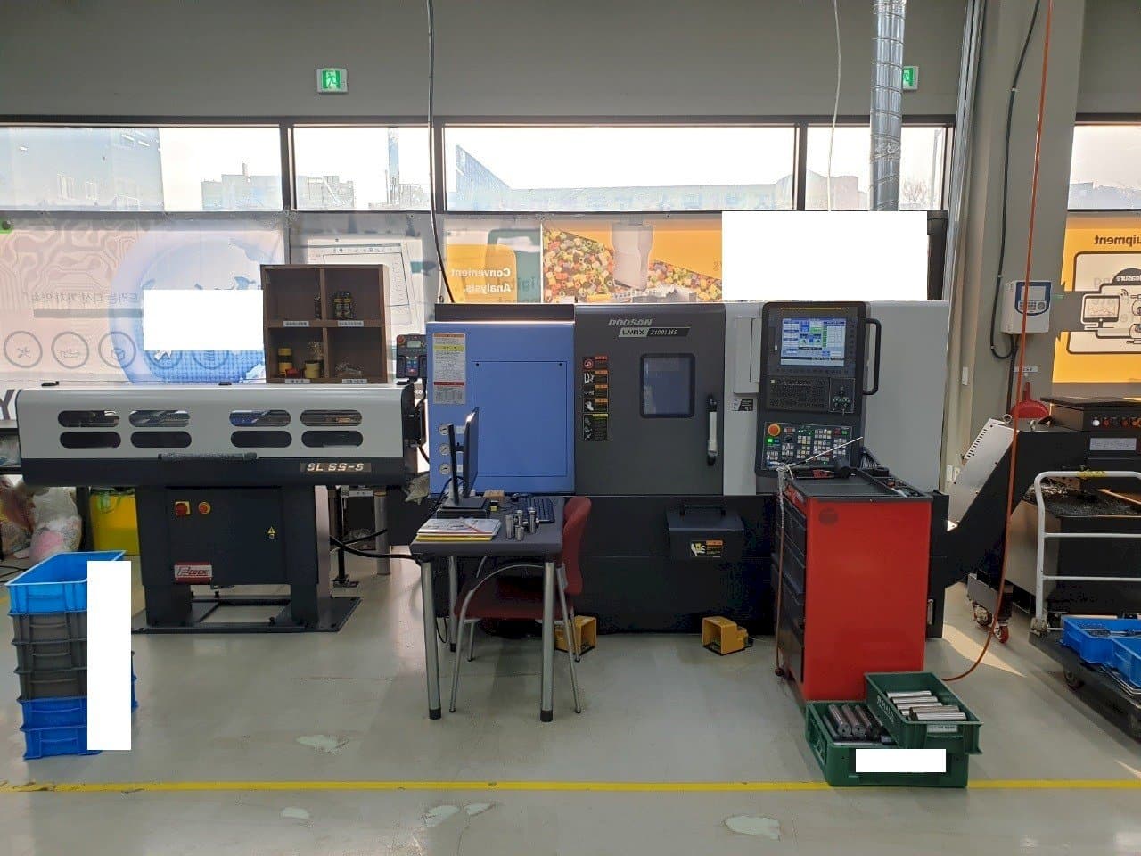 Koneen Doosan LYNX2100LMSB etunäkymä