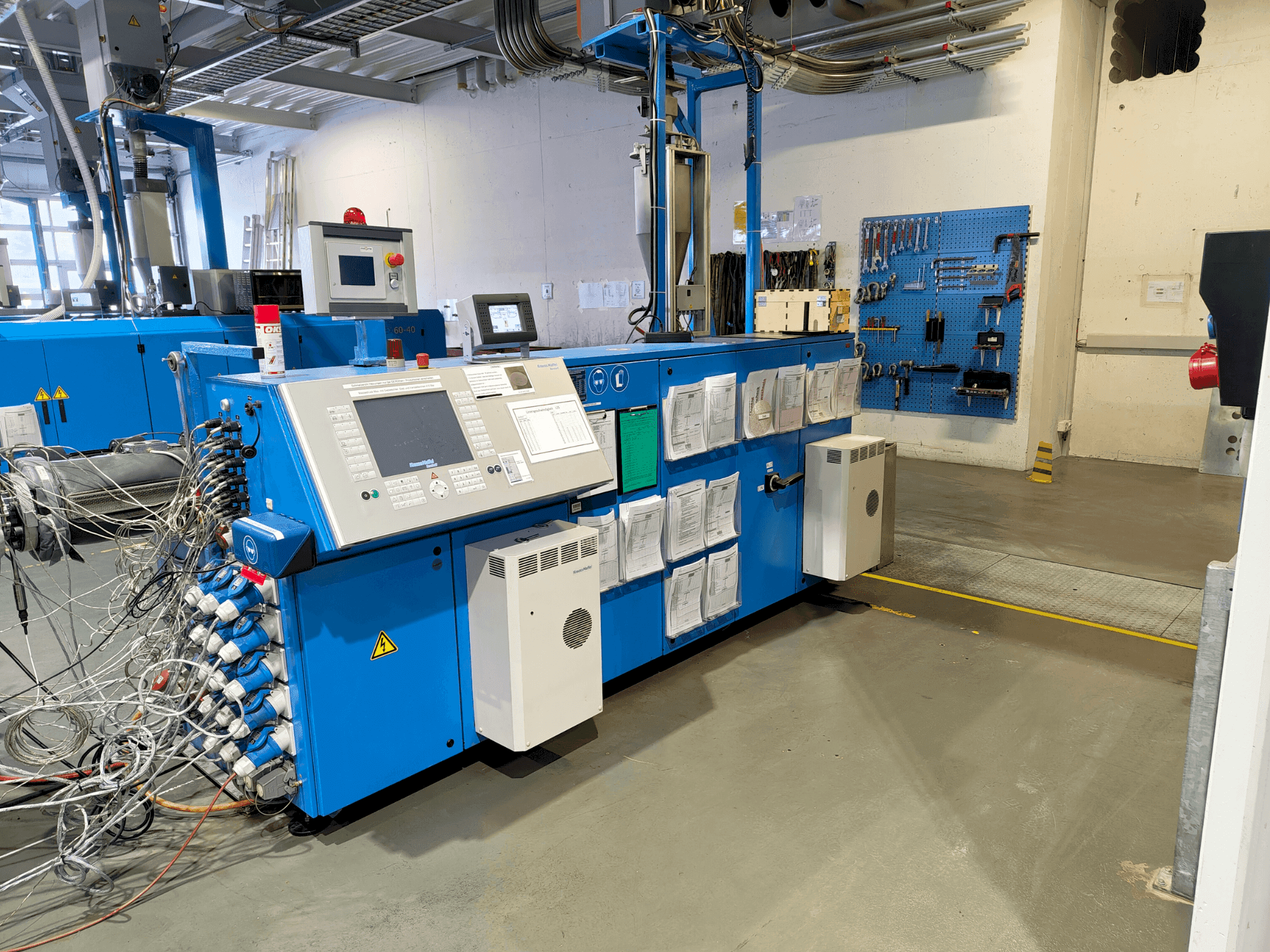 Koneen Krauss Maffei KME 75-36 R AC etunäkymä