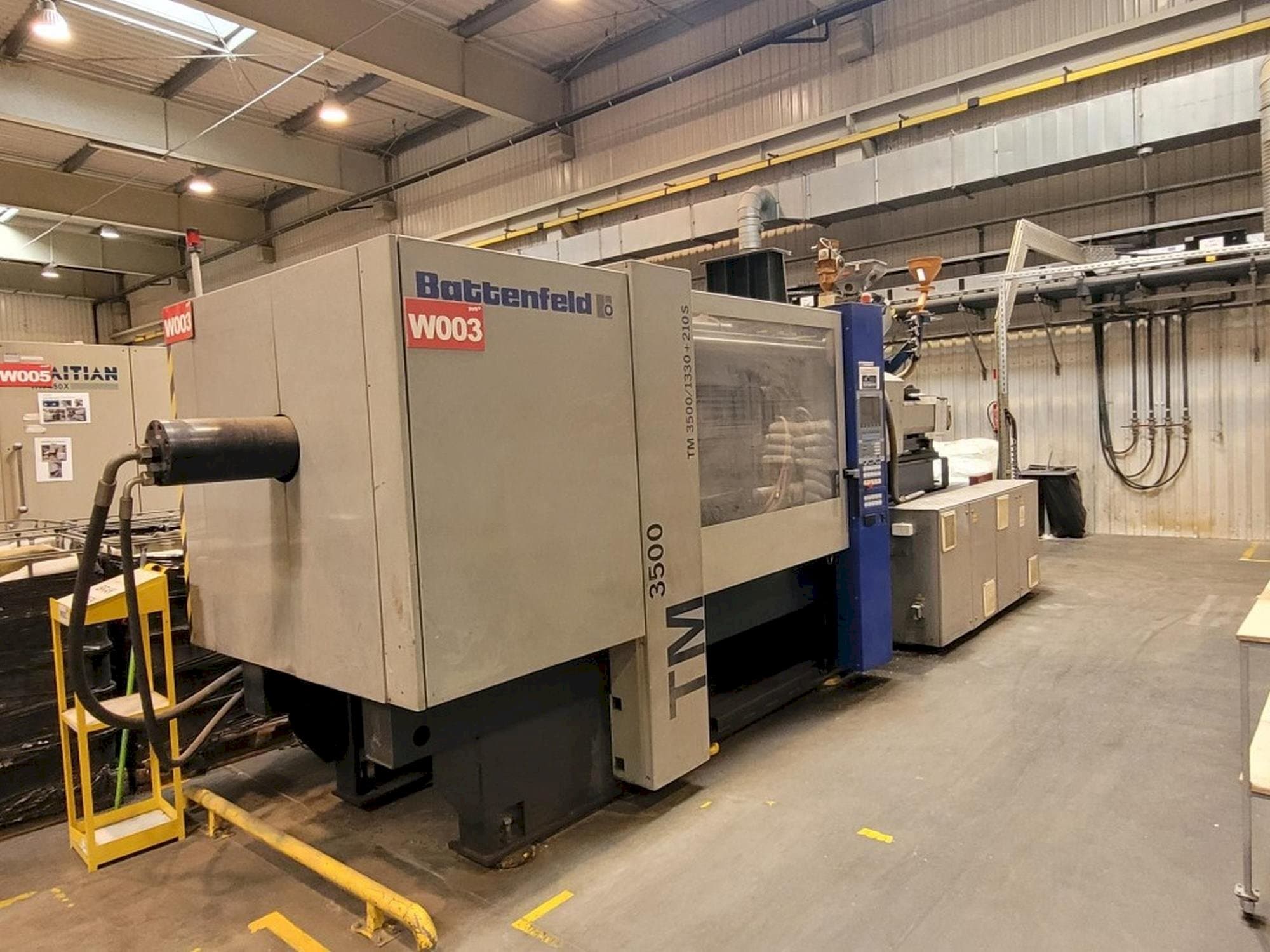 Koneen Battenfeld TM 3500/1330+210S etunäkymä