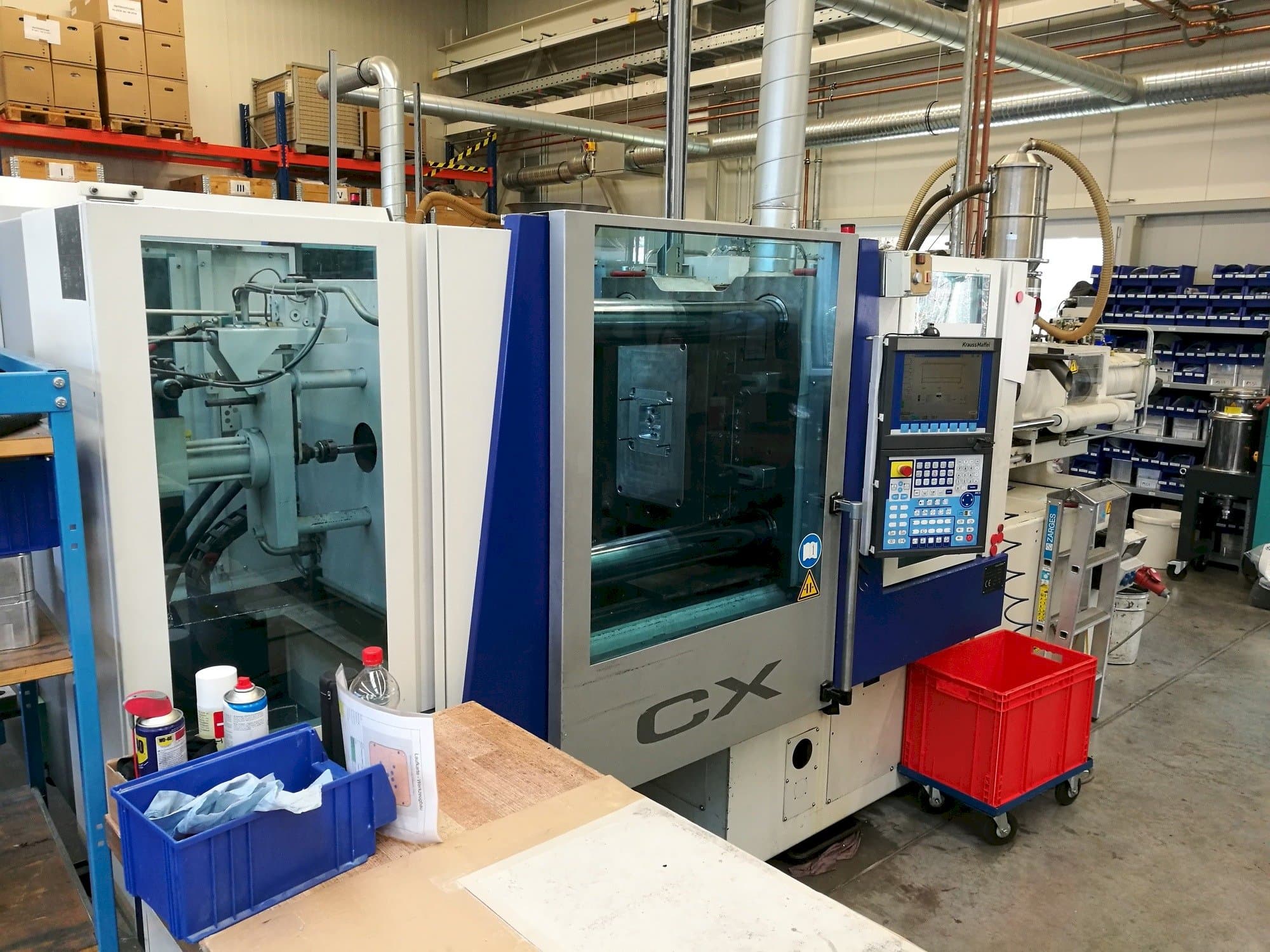 Koneen Krauss Maffei 160-1000 CX etunäkymä