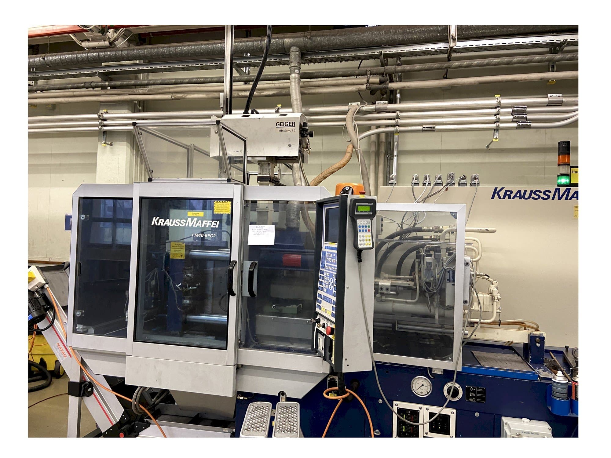 Koneen Krauss Maffei 40-55 C2 etunäkymä