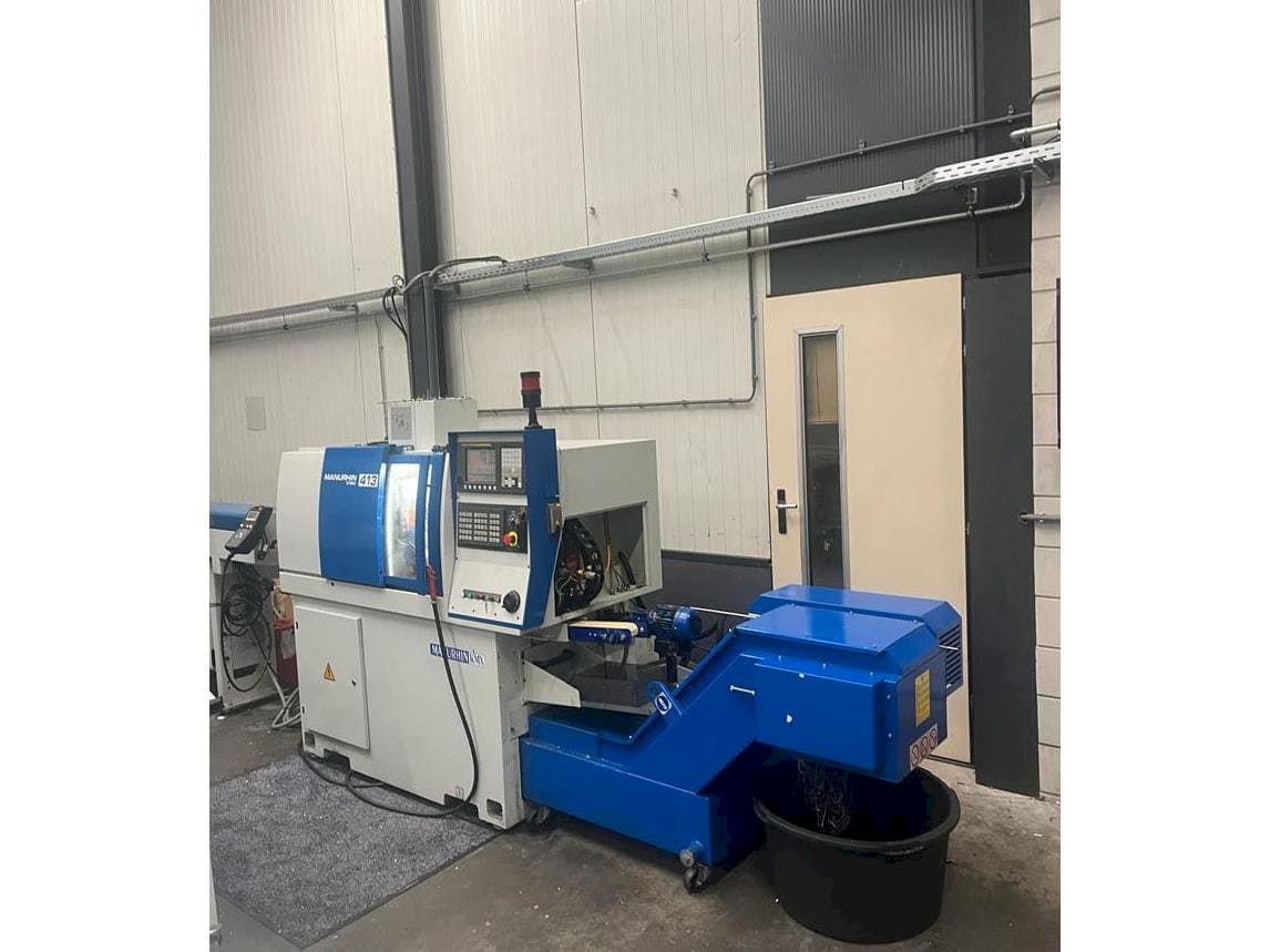 Koneen Manurhin K'MX 413 etunäkymä