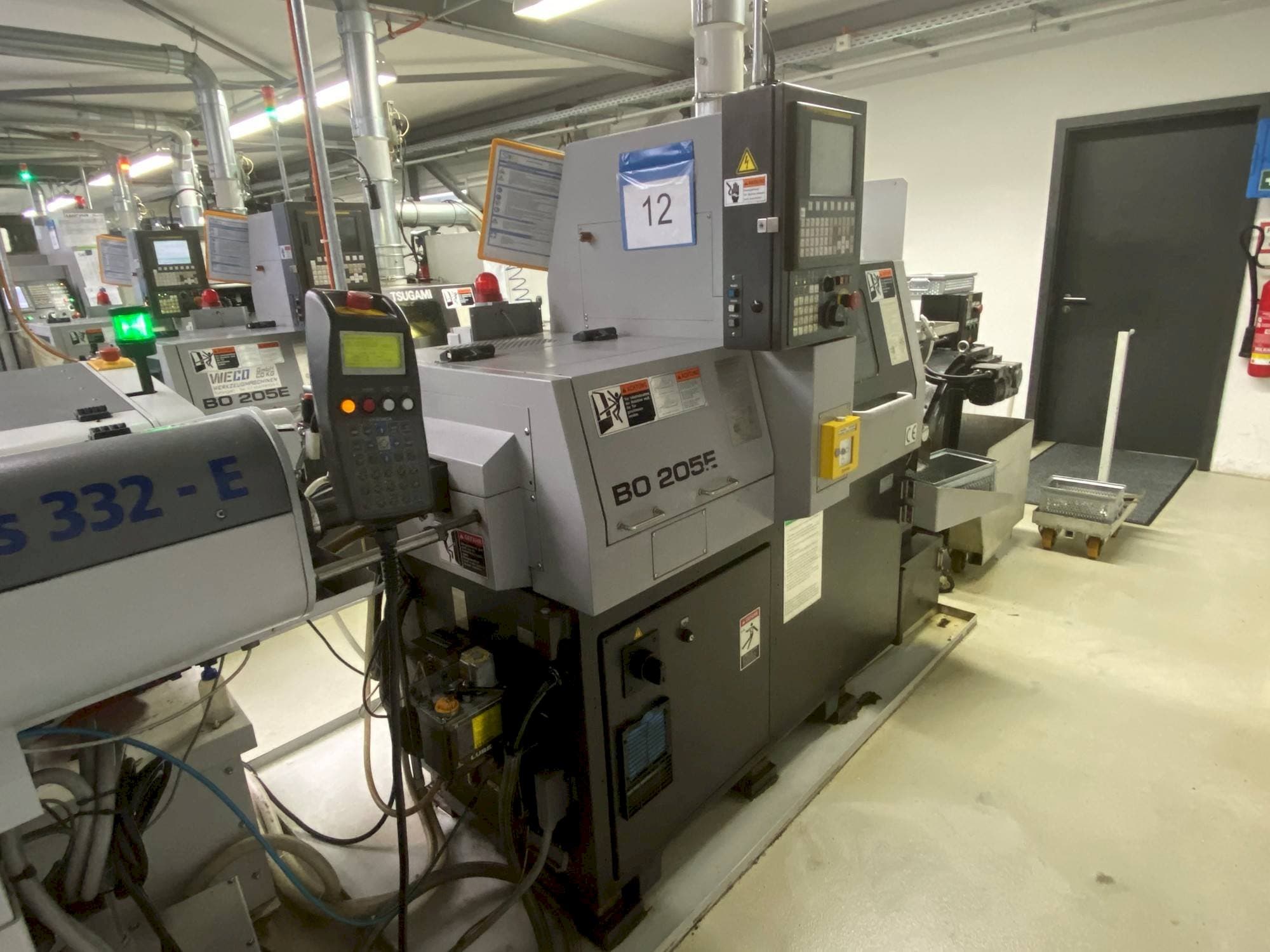 Koneen  TSUGAMI Bo205 Eii etunäkymä