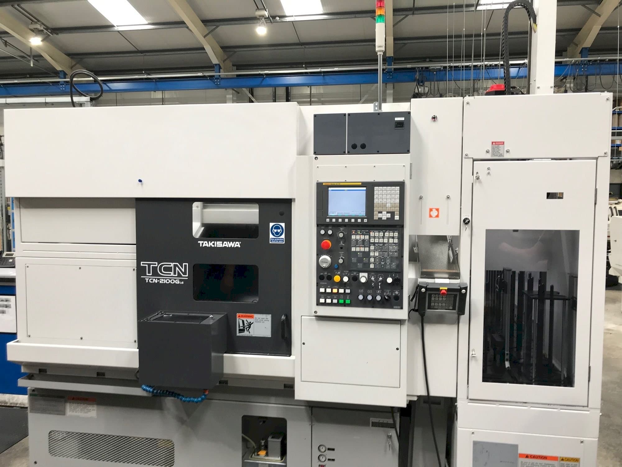 Koneen Takisawa TCN-2100G L6 etunäkymä