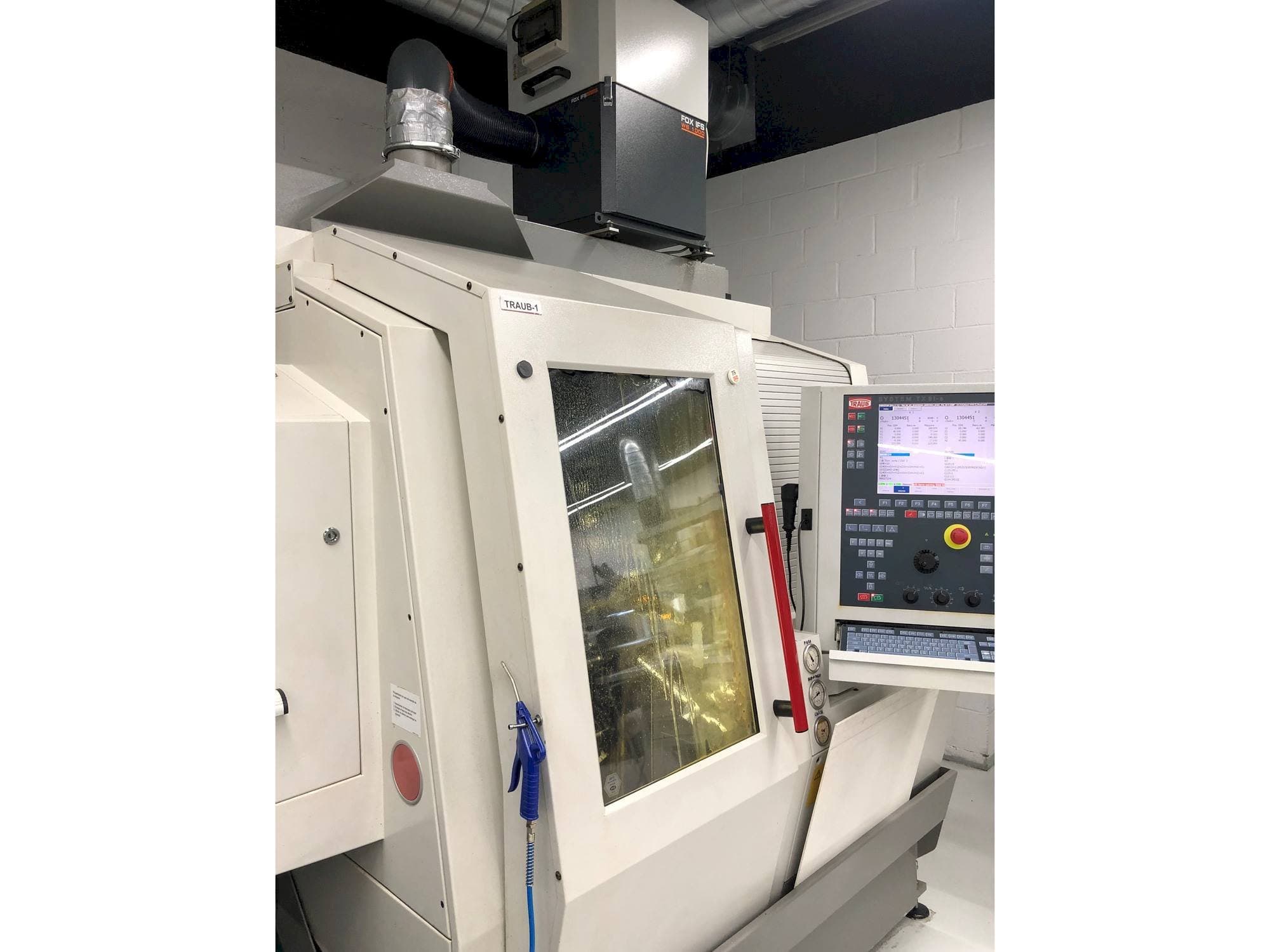 Koneen TRAUB TNL 18 etunäkymä