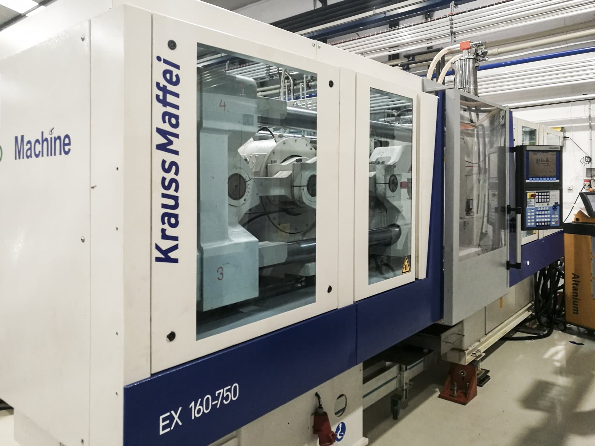 Koneen Krauss Maffei vasen näkymä160-750 EX