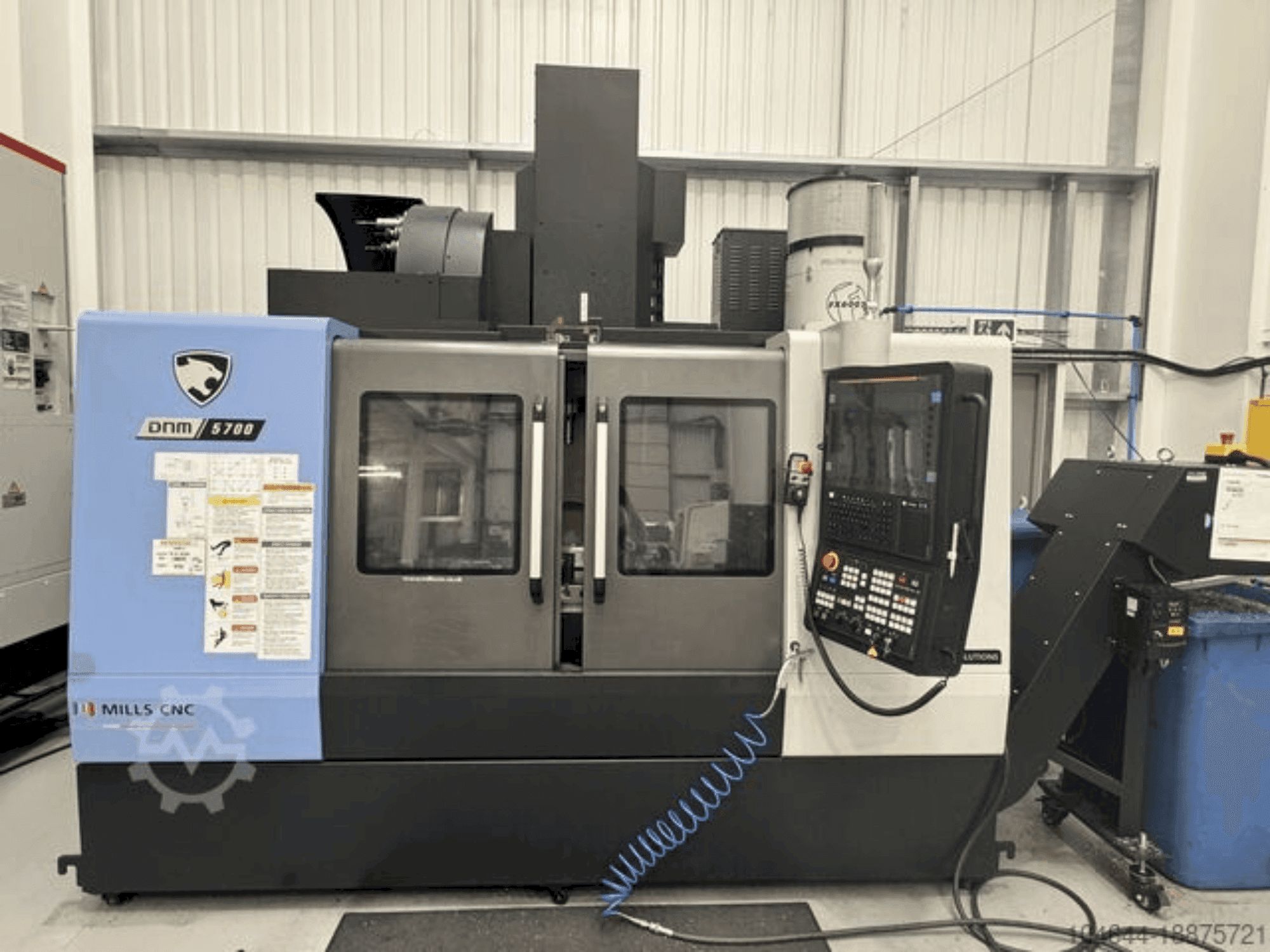 Koneen DOOSAN DNM 5700 etunäkymä