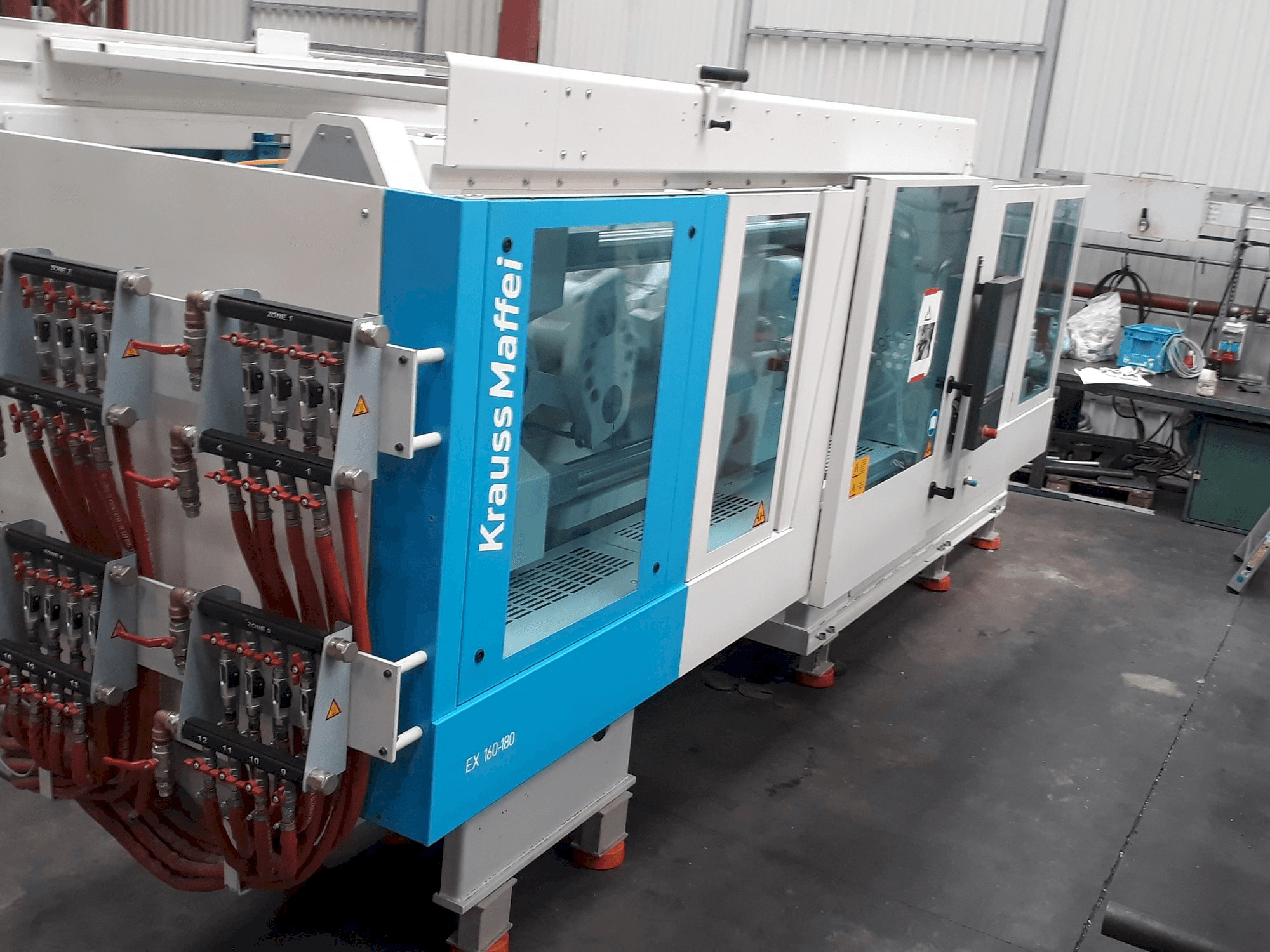 Koneen Krauss Maffei 160-180 EX vasemman sivun näkymä