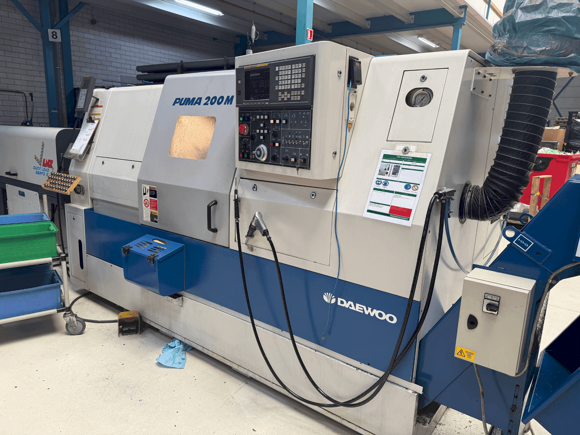 Koneen DAEWOO Puma 200 LMC etunäkymä