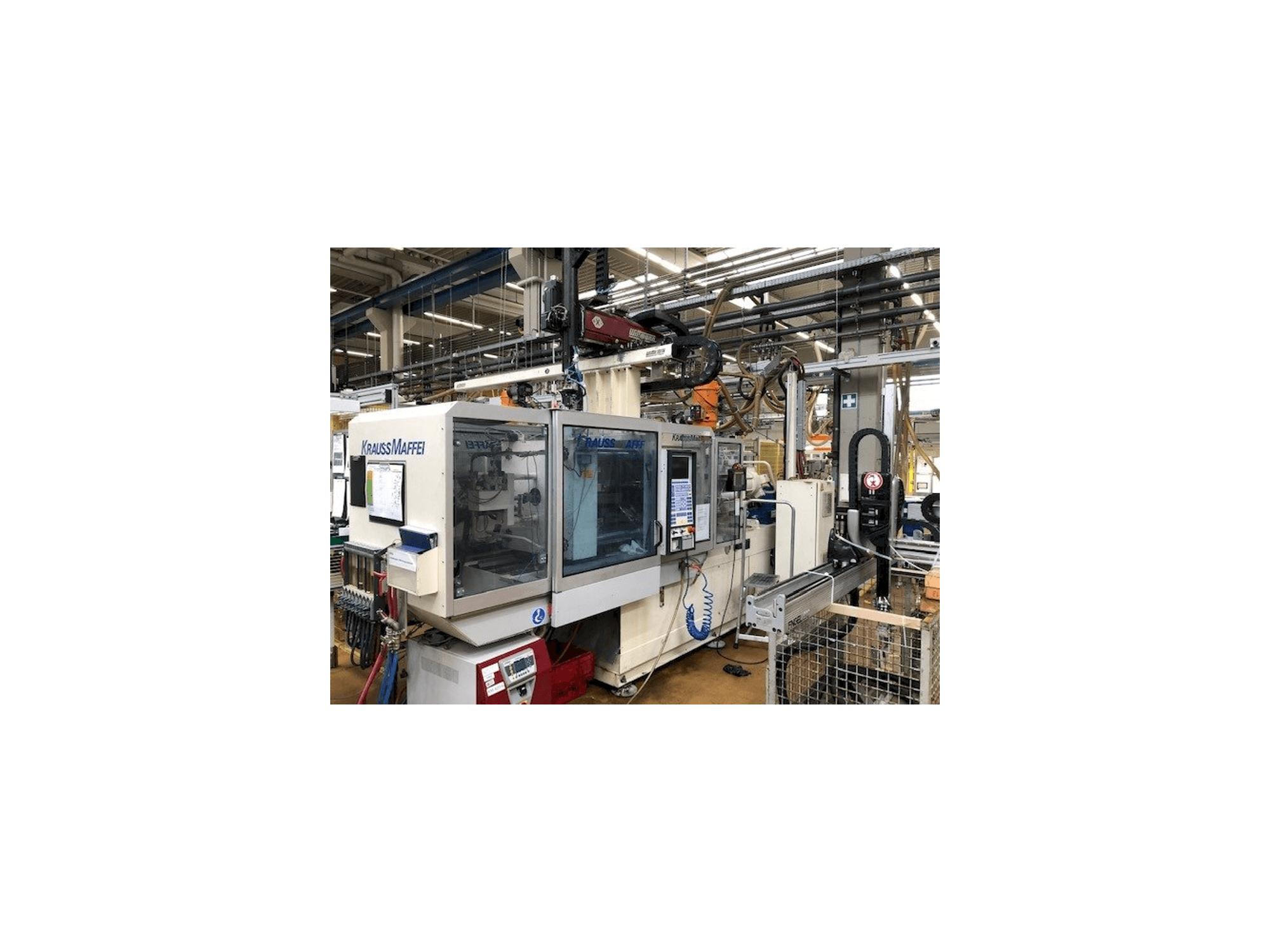 Koneen Krauss Maffei 150-700 C2 etunäkymä