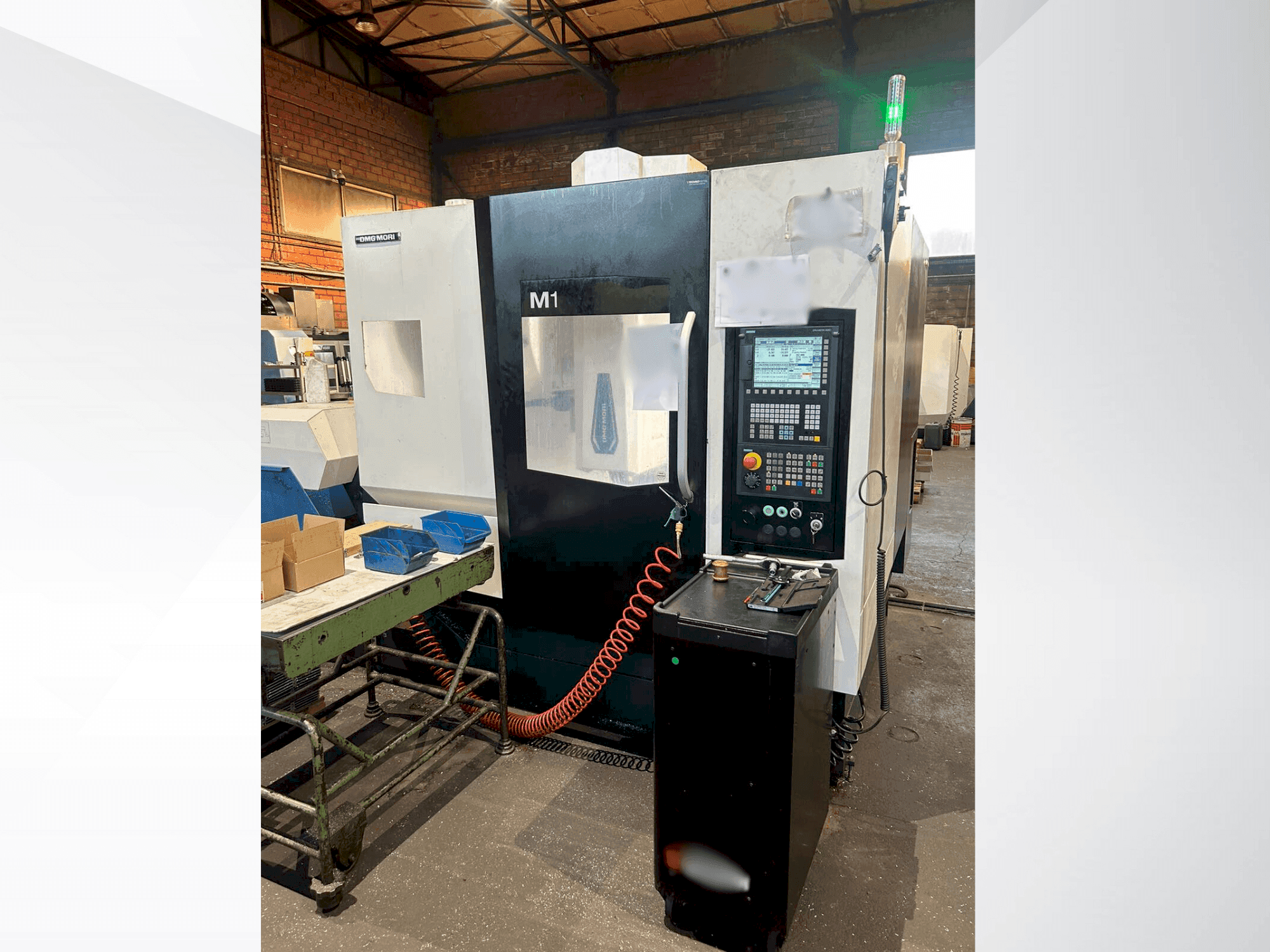 Koneen DMG MORI M1 PRO etunäkymä