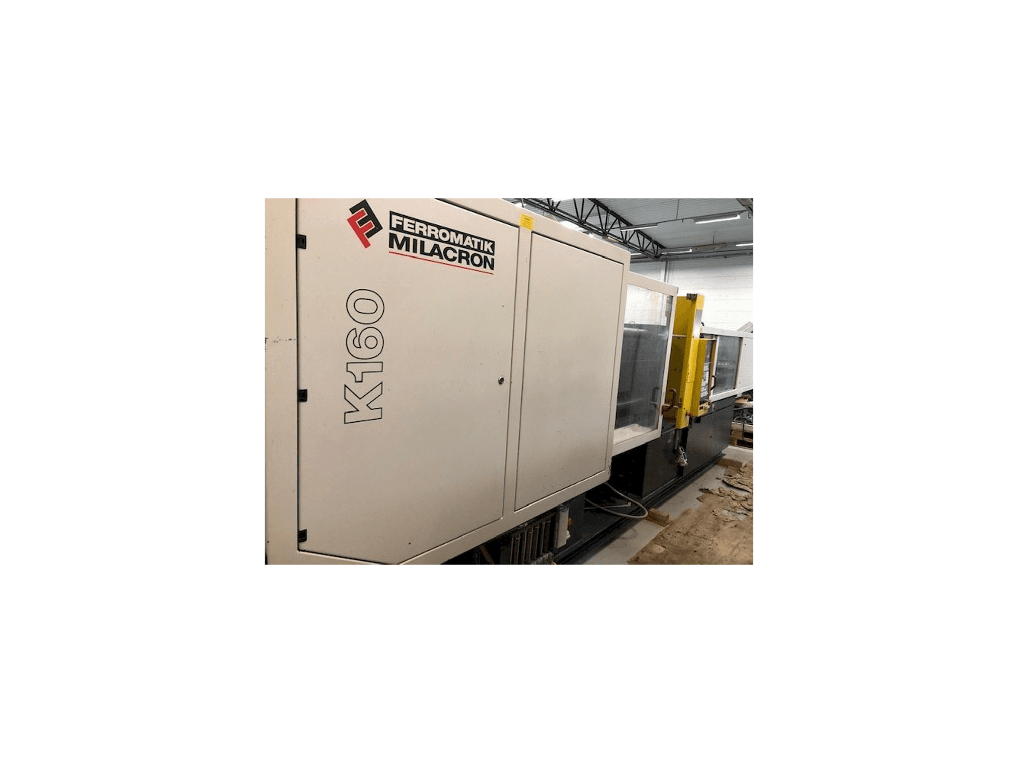 Koneen Ferromatik MILACRON K160 etunäkymä