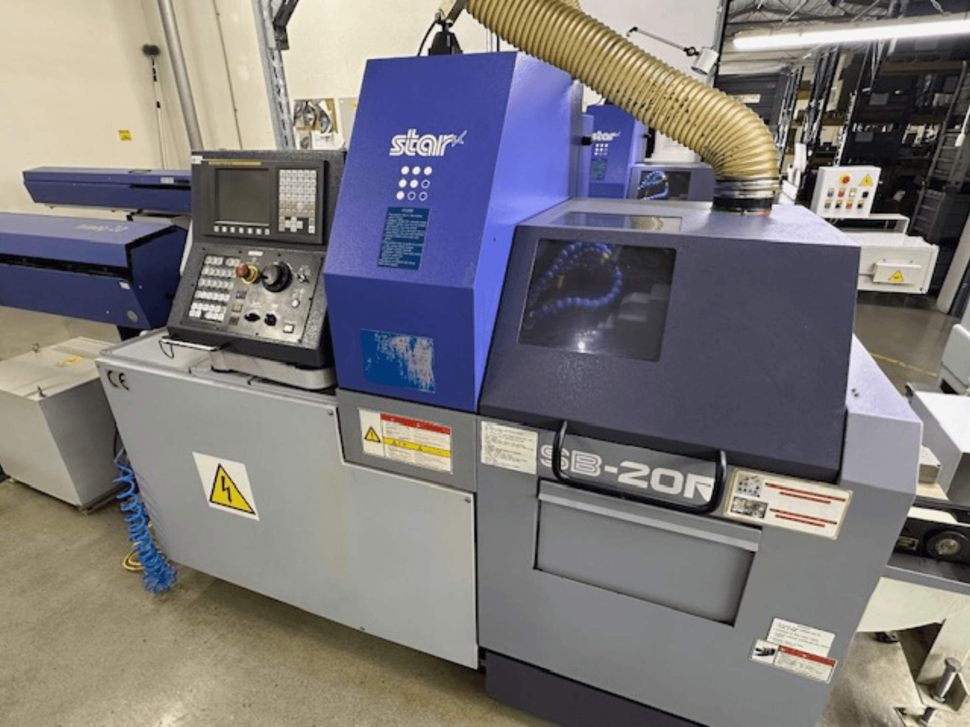 Star SB-20R tyyppi N sveitsiläinen sorvauskone, etukuva, jossa on ohjauspaneeli, imuletku ja näkyvät vaarasymbolit.