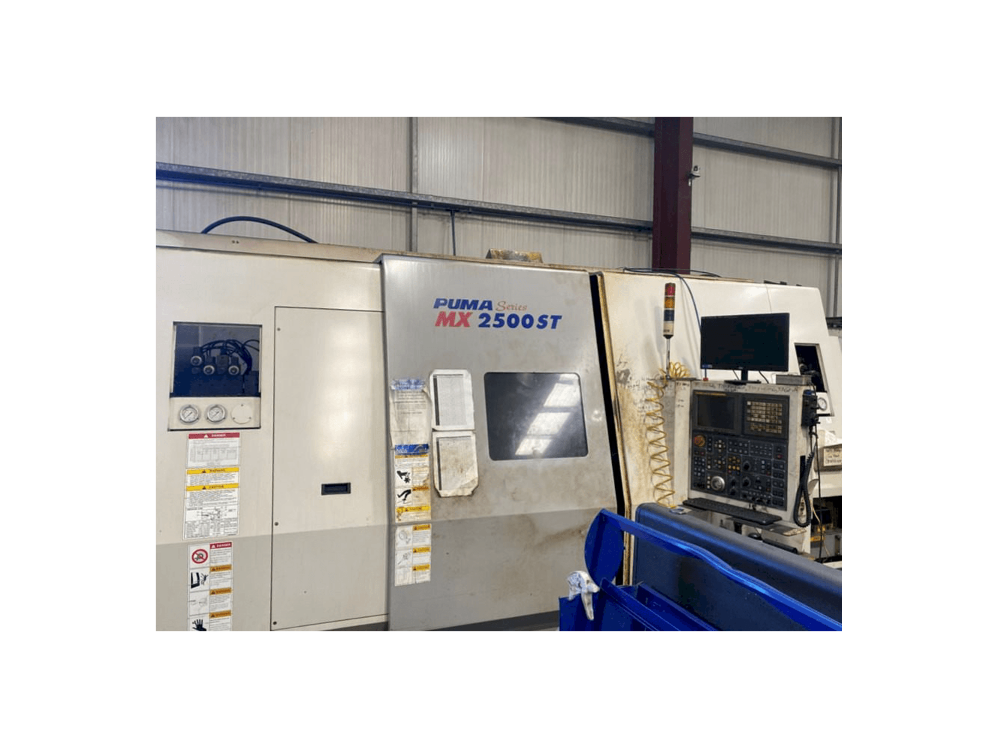 Koneen DAEWOO PUMA MX2500ST etunäkymä