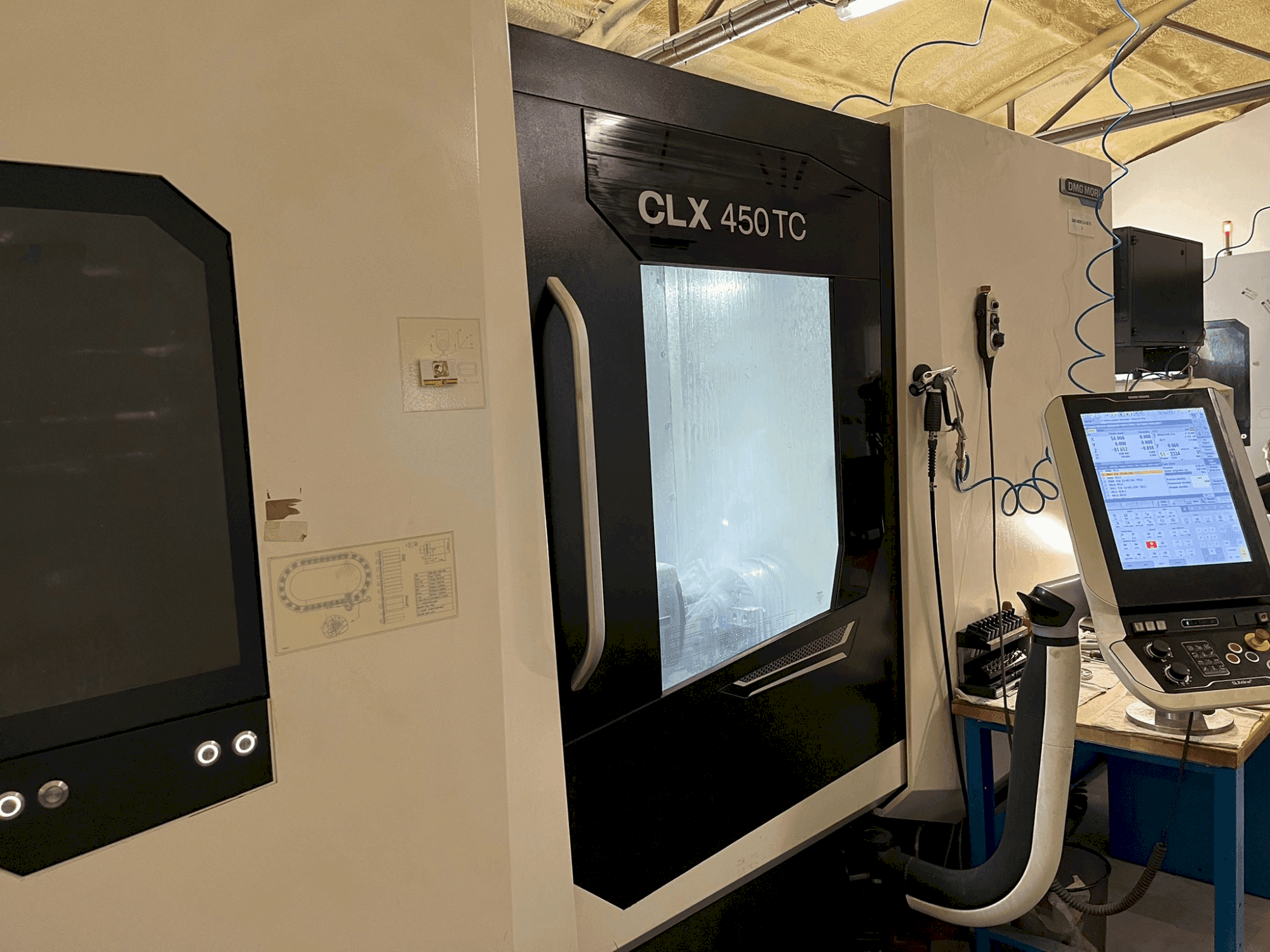 Koneen DMG MORI CLX 450 TC etunäkymä