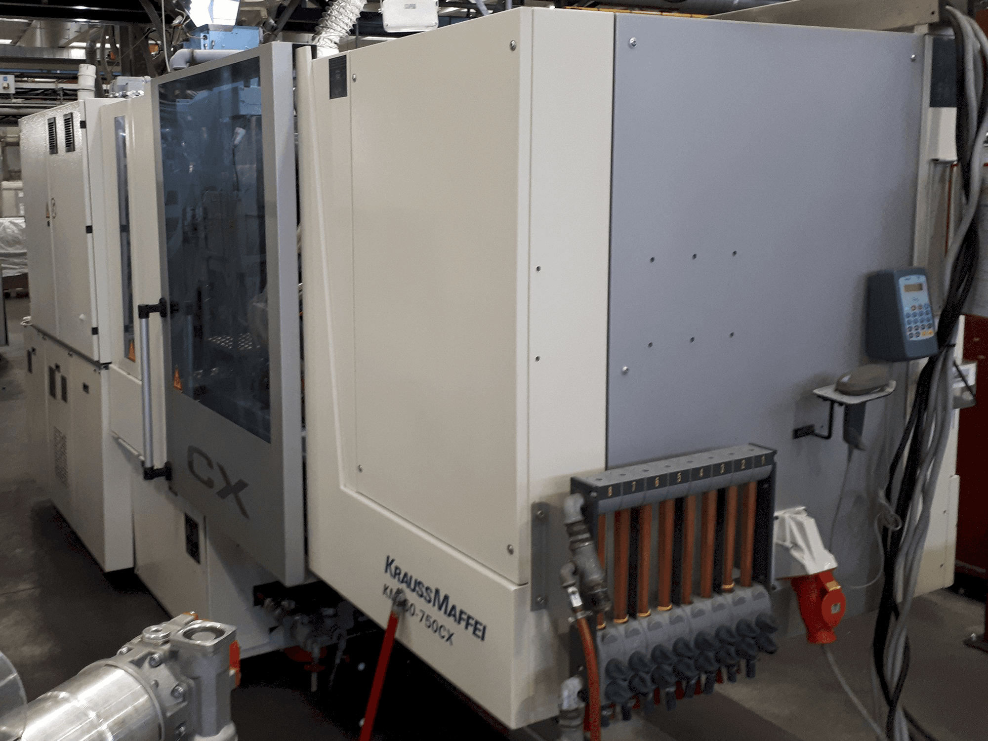 Koneen Krauss Maffei etunäkymä 160-750 CX