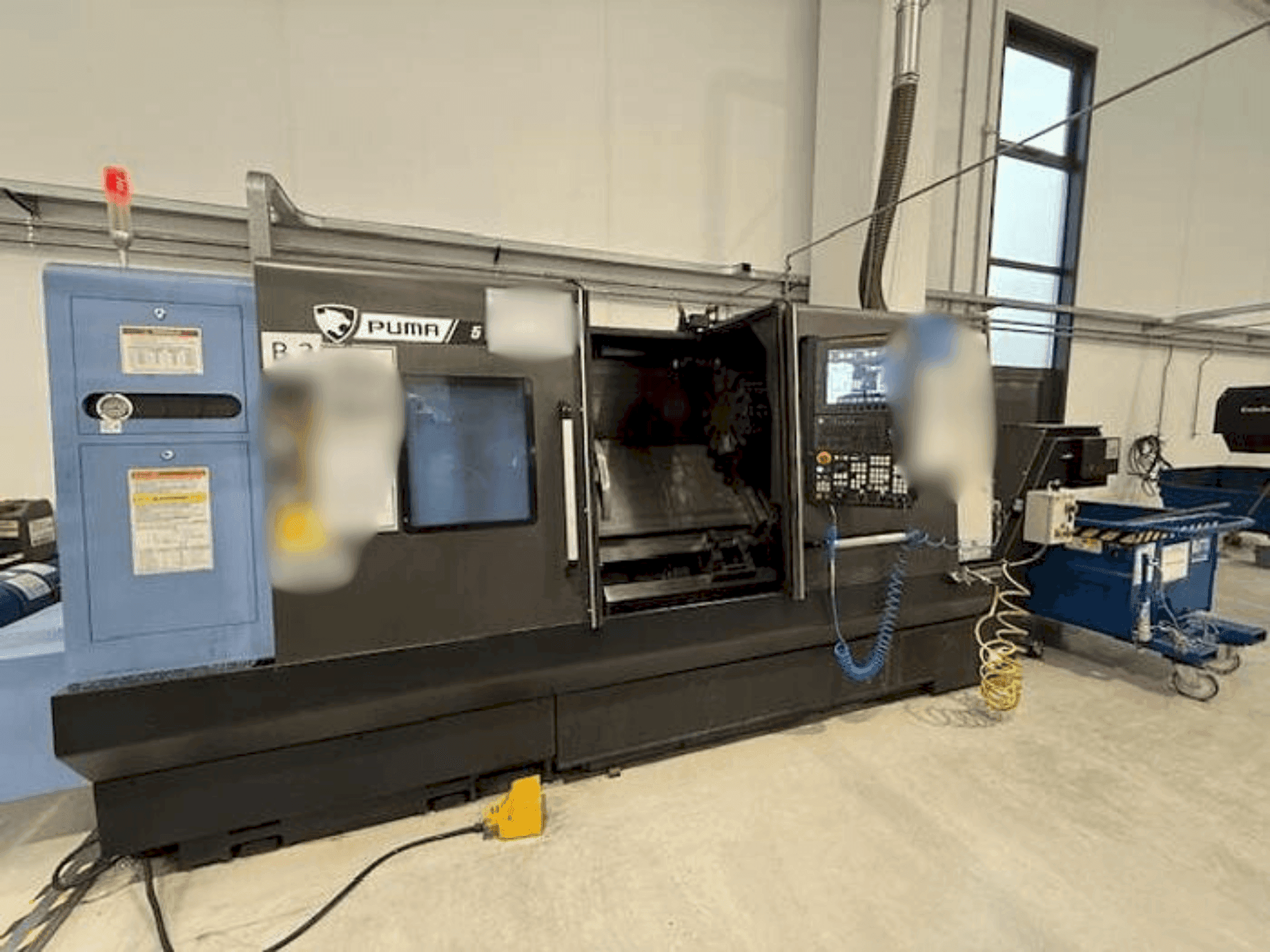 Koneen DOOSAN PUMA 5100A etunäkymä