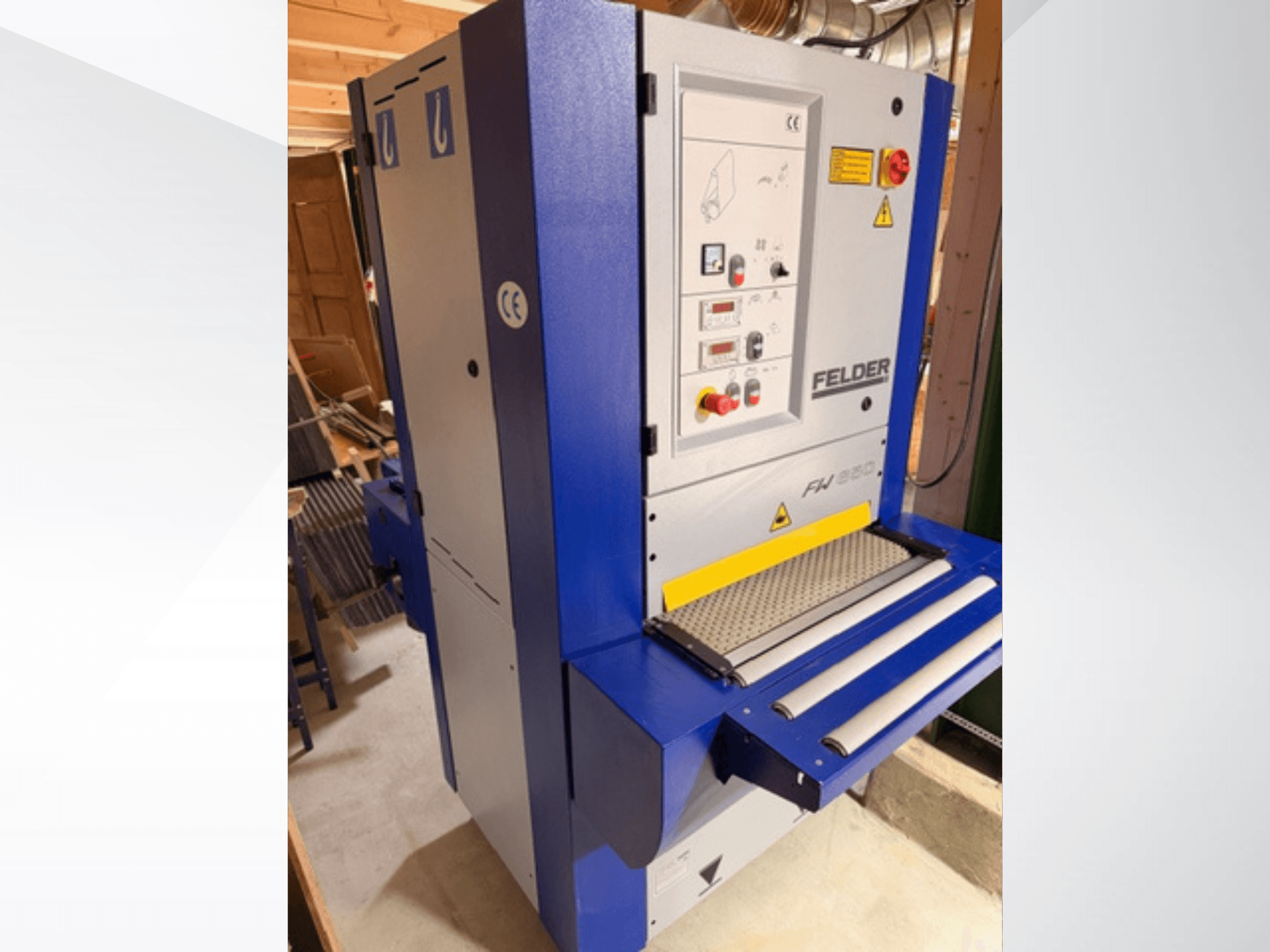 Felder FH 930 -höylä, etukuva, jossa ohjauspaneeli, turvatoiminnot ja syöttö- ja poistorullat näkyvissä.