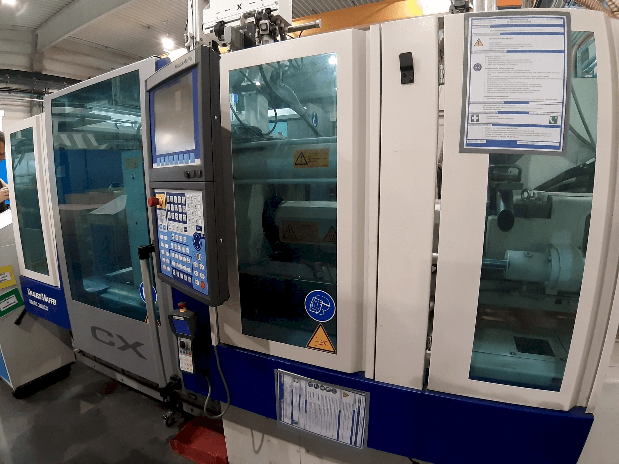 Koneen Krauss Maffei 80 - 380 CX etunäkymä