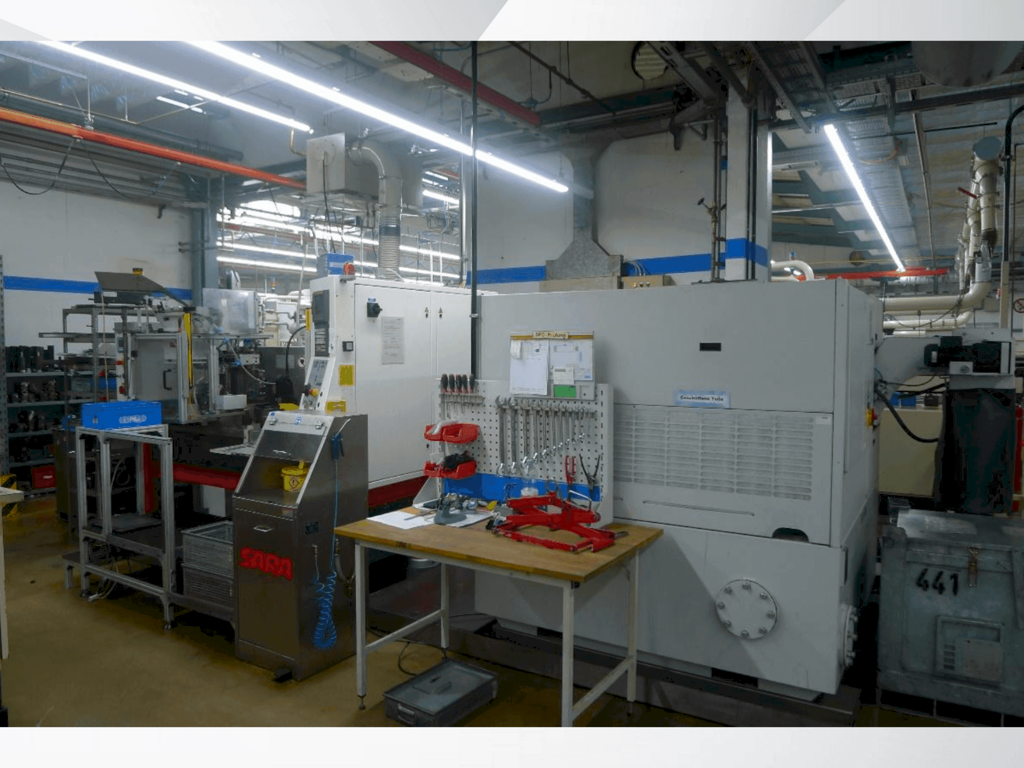 Koneen TSCHUDIN ecoLine 400 sivunäkymä