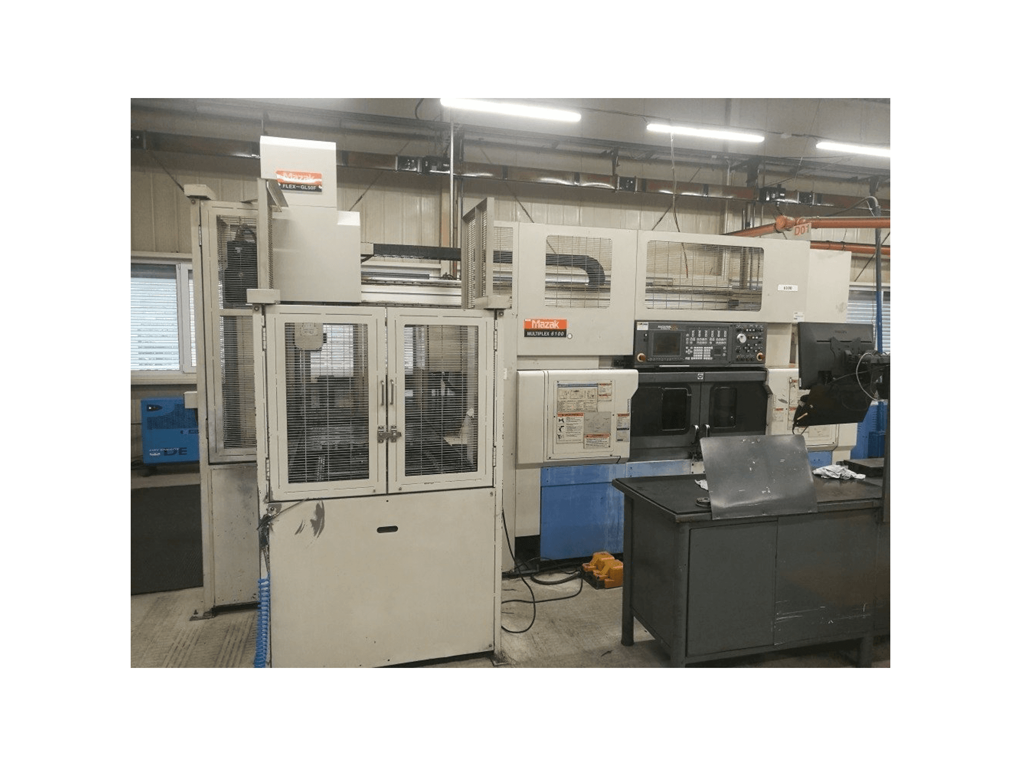 Koneen Mazak Multiplex 6100 + robot FLEX-GL50F etunäkymä