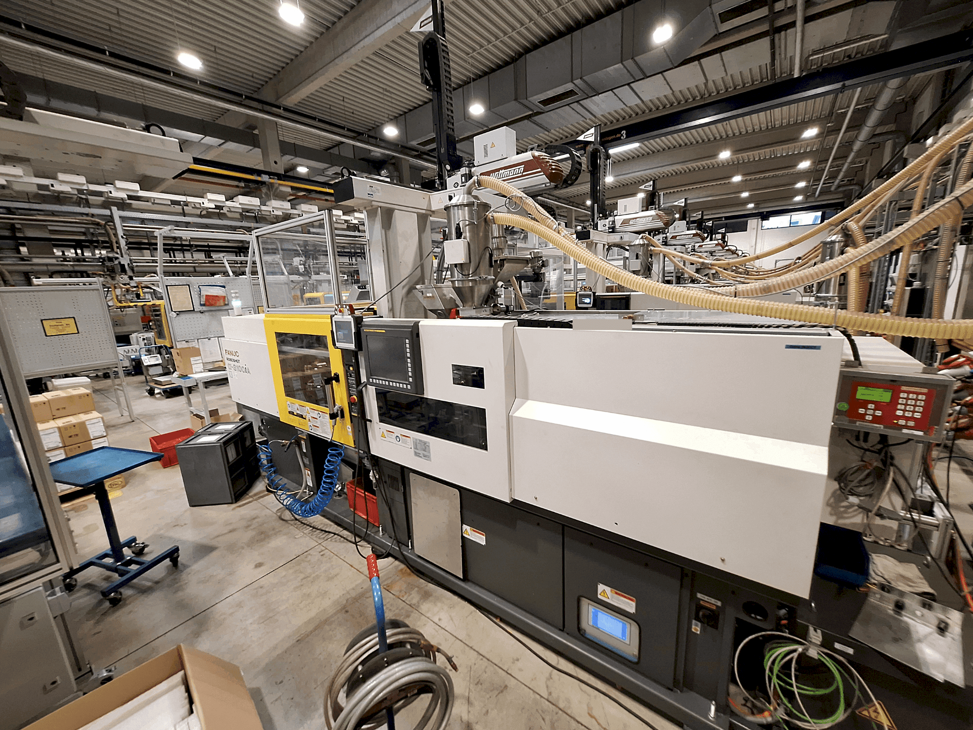Koneen FANUC Roboshot S100iA etunäkymä
