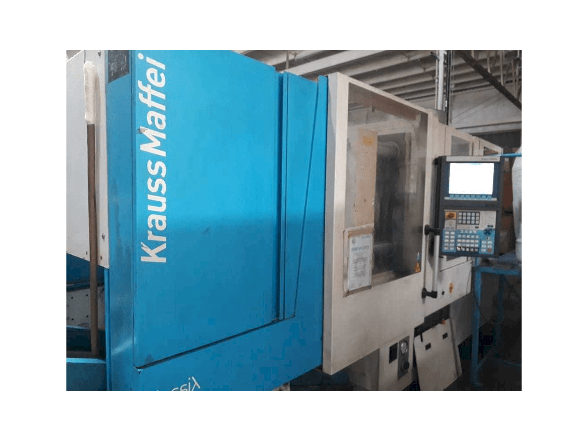 Koneen Krauss Maffei 160/750 CX etunäkymä