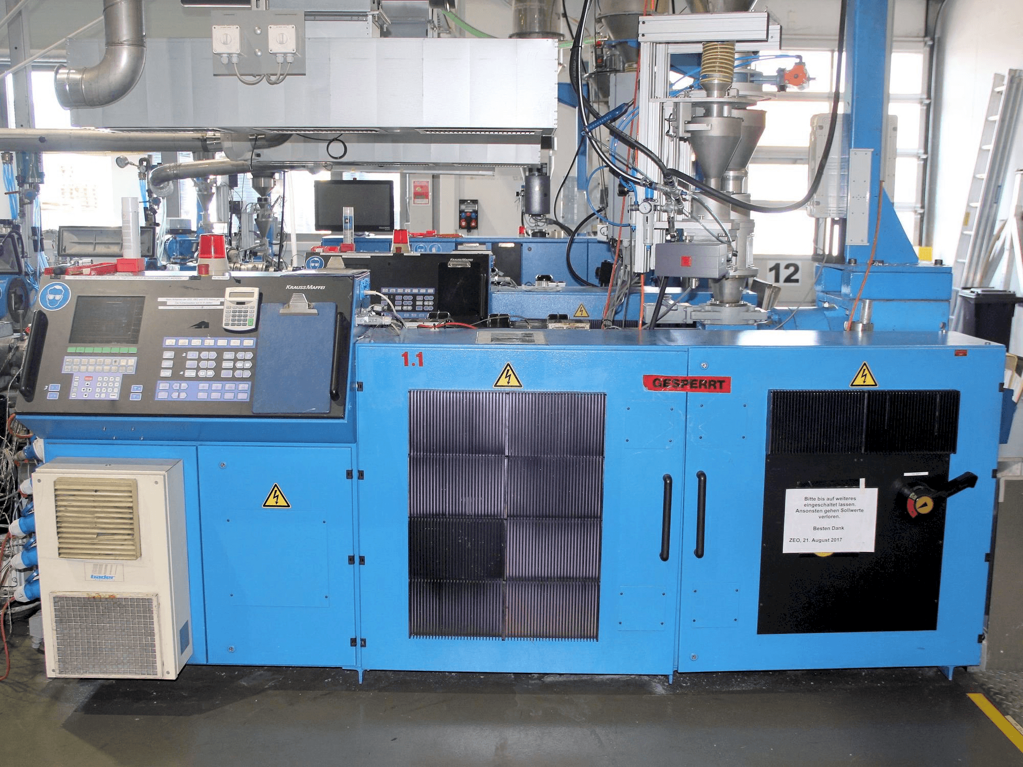 Koneen Krauss Maffei KME 1-75-30 B etunäkymä