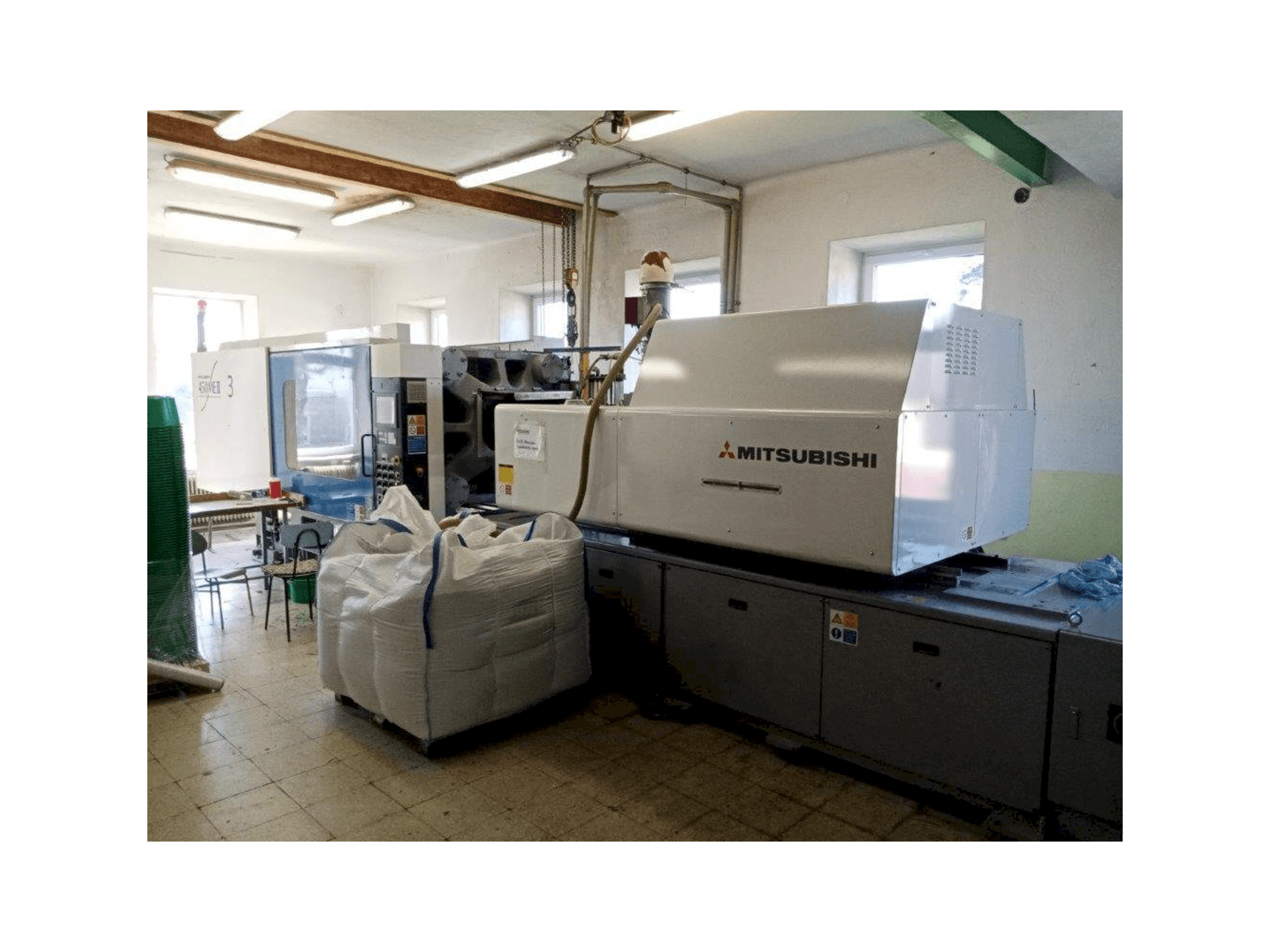 Koneen Mitsubishi 450 ME II-70 etunäkymä