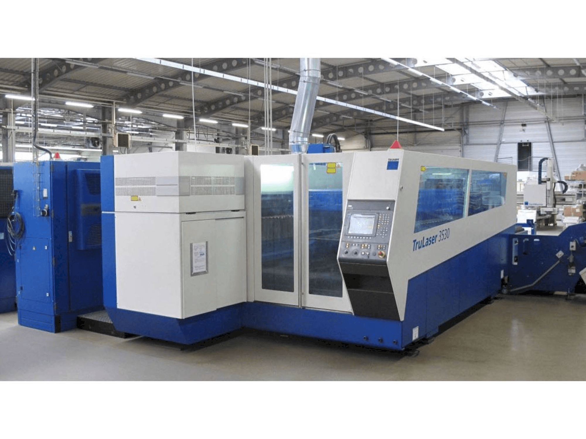 Koneen Trumpf TruLaser 3530 + Lift Master etunäkymä