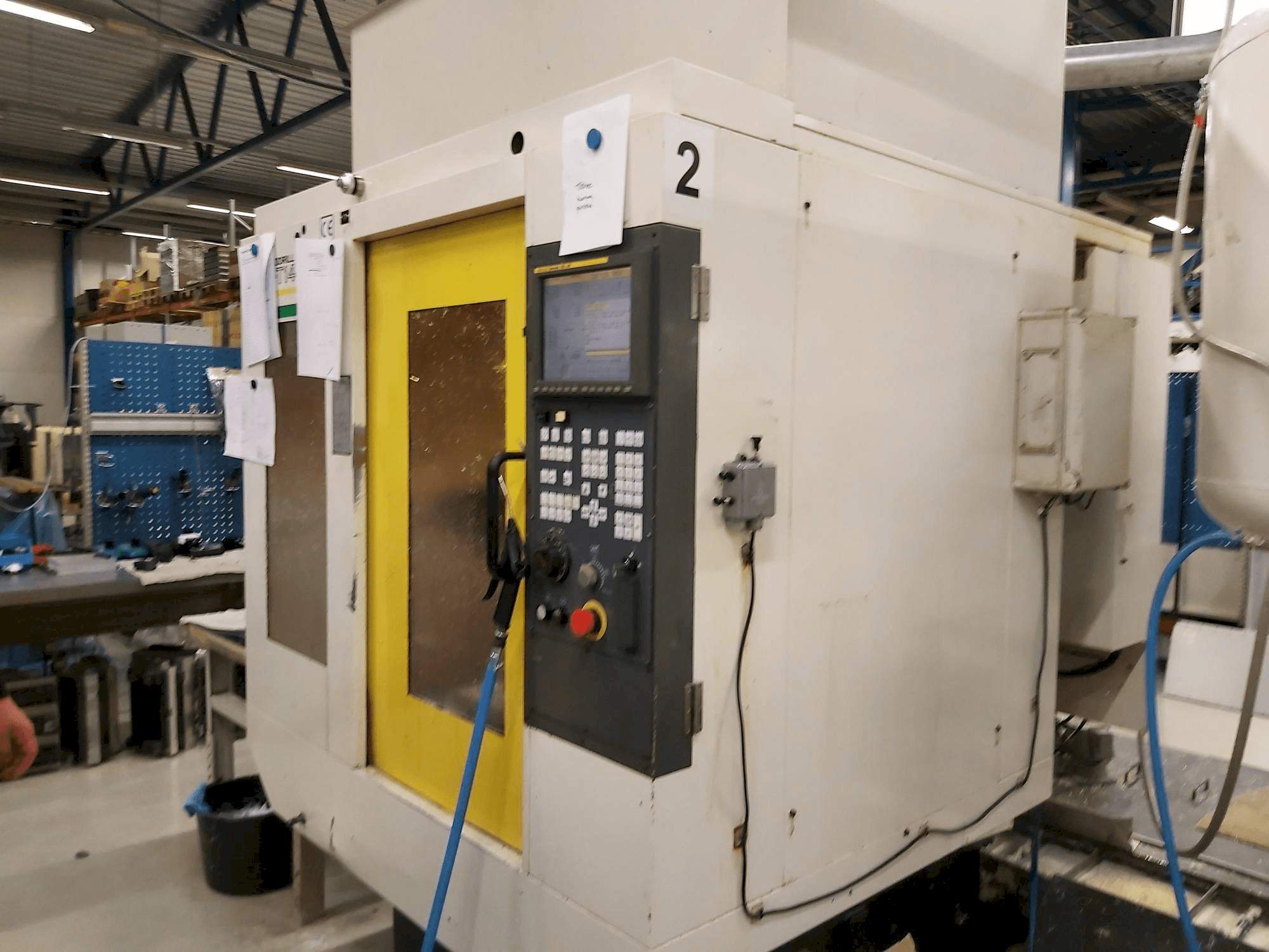 Koneen FANUC Robodrill alfa-T14iB etunäkymä