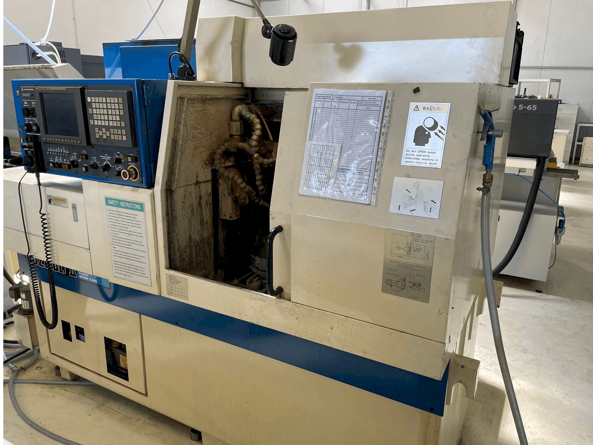 Koneen TSUGAMI BS20-II oikean sivun näkymä