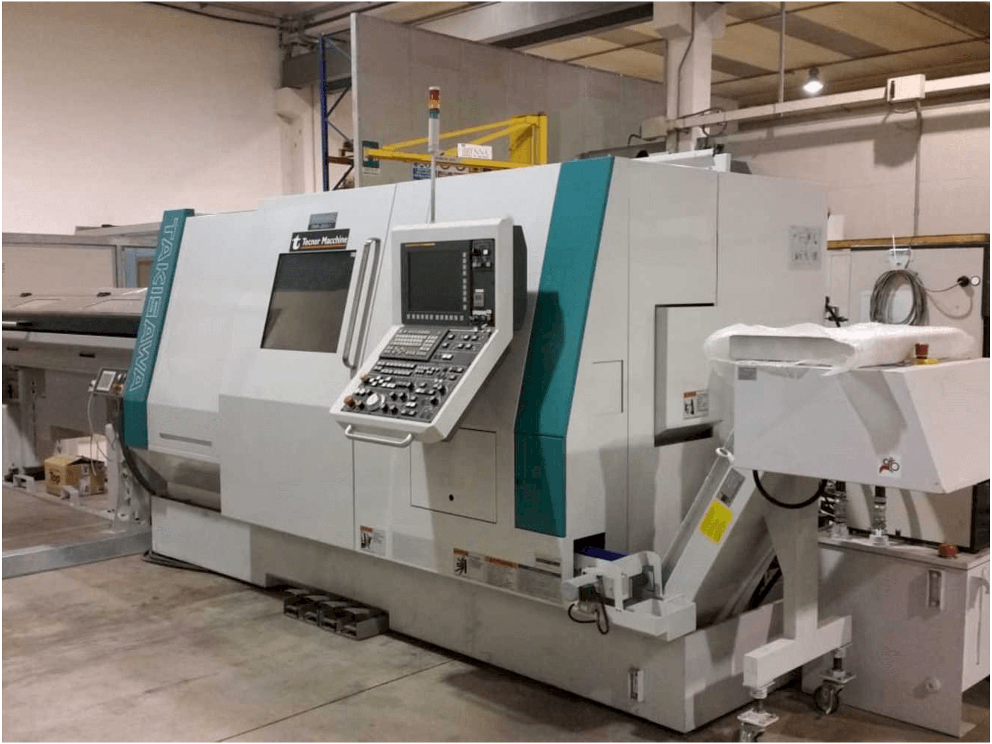 Koneen Takisawa TMMY-250 M1 etunäkymä