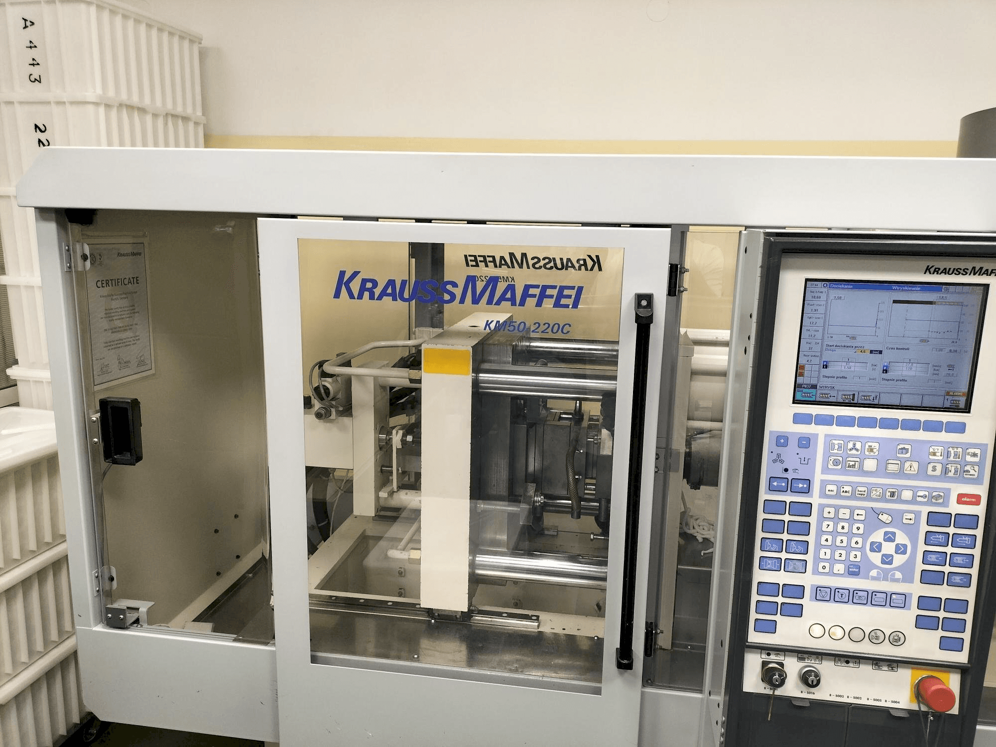 Koneen Krauss Maffei KM 50-220C Win etunäkymä