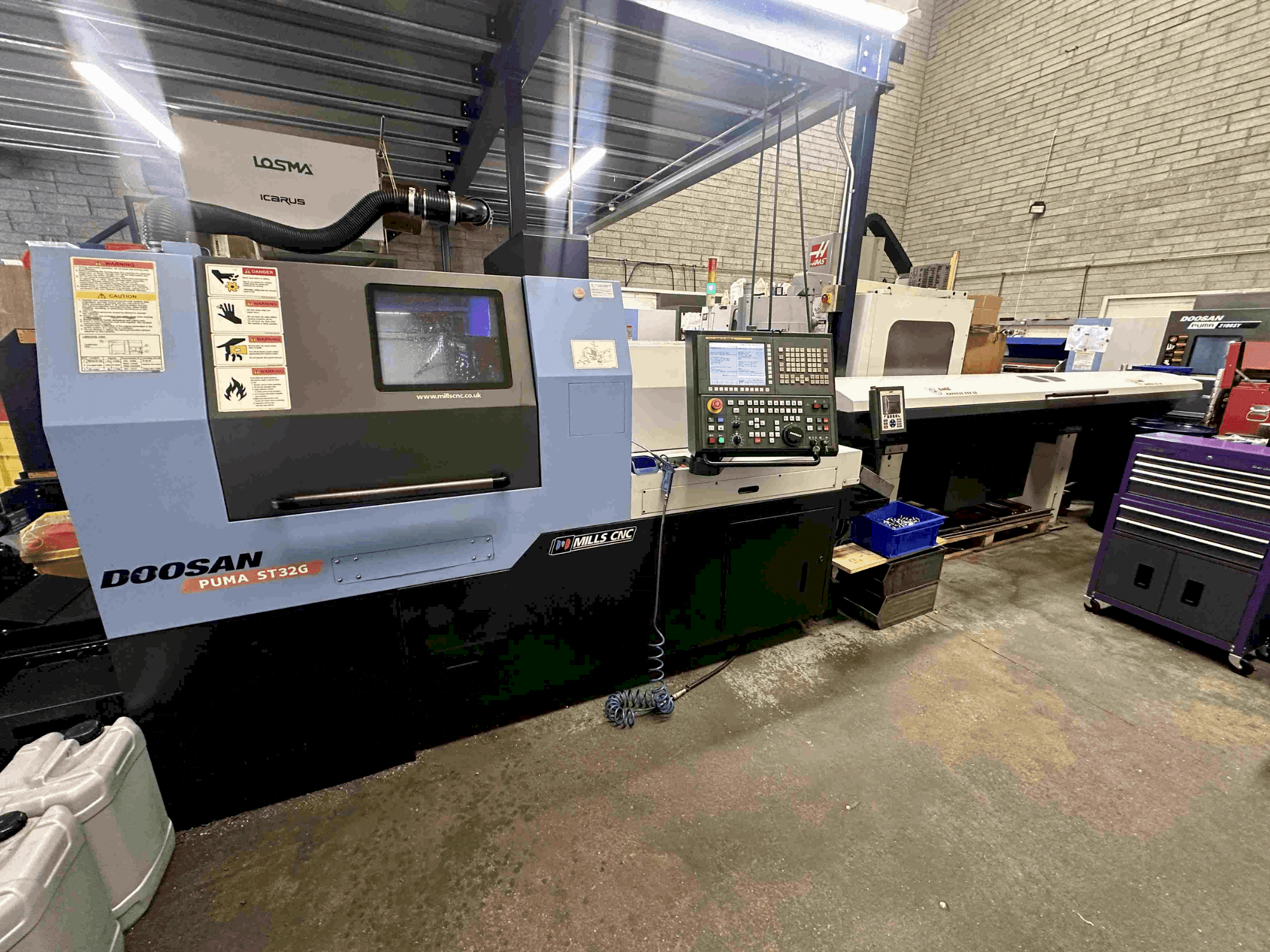 Koneen DOOSAN Puma ST32G etunäkymä