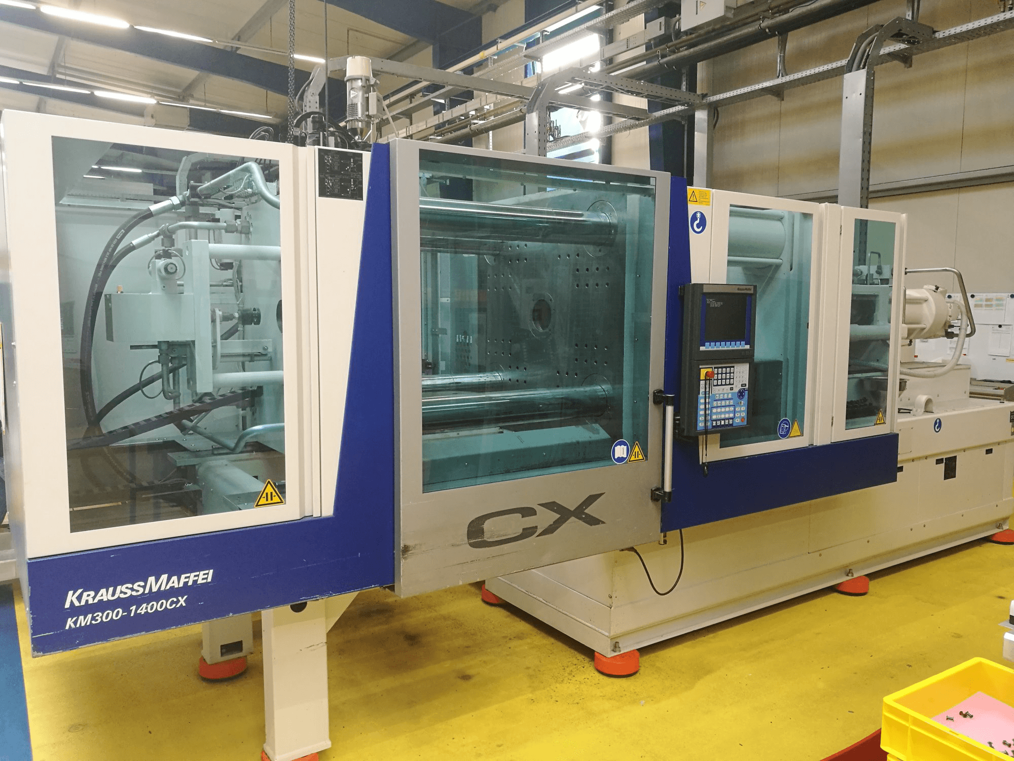 Koneen Krauss Maffei etunäkymä 300-1400 CX