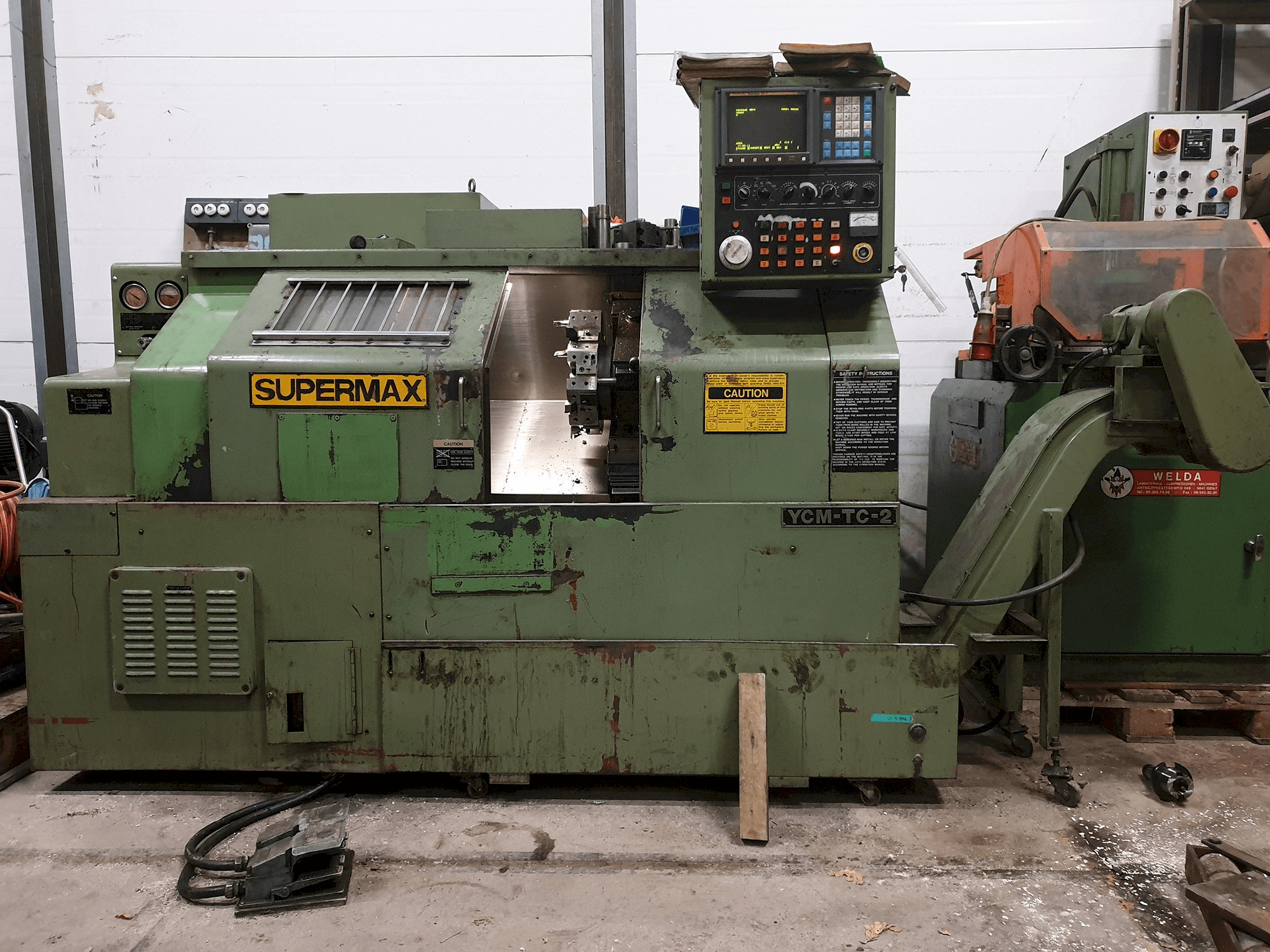 Koneen SUPERMAX etunäkymä YCM-TC-2