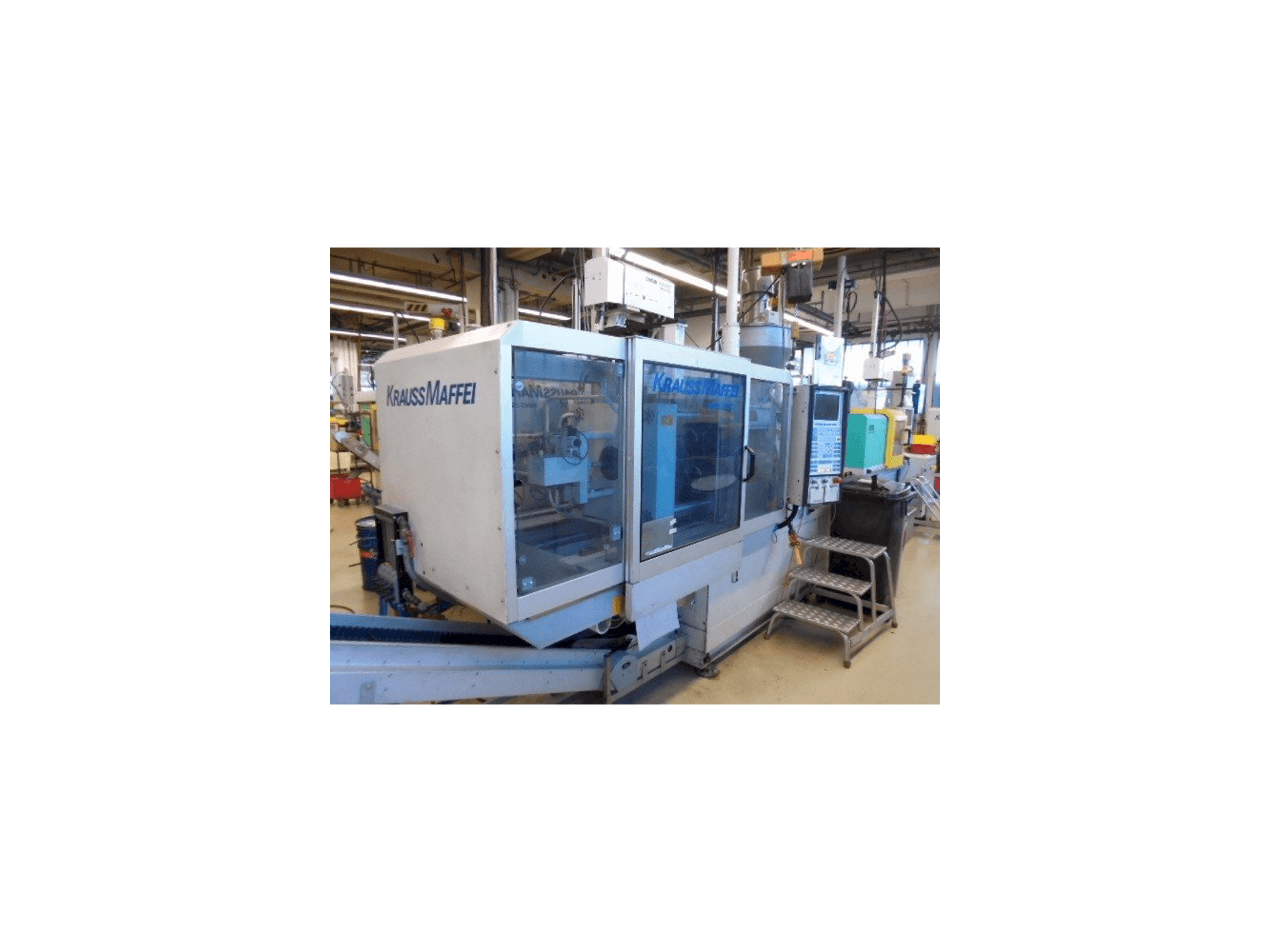 Koneen Krauss Maffei KM 65-390-C2 vasemman sivun näkymä