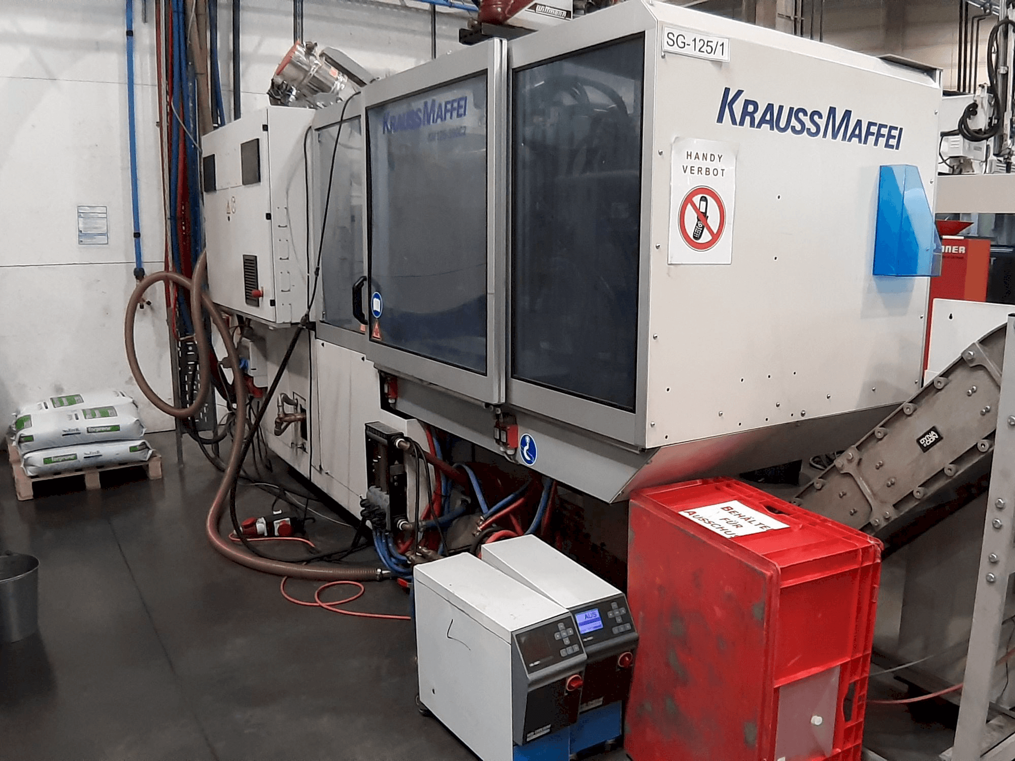 Koneen Krauss Maffei 125 - 390 CX etunäkymä