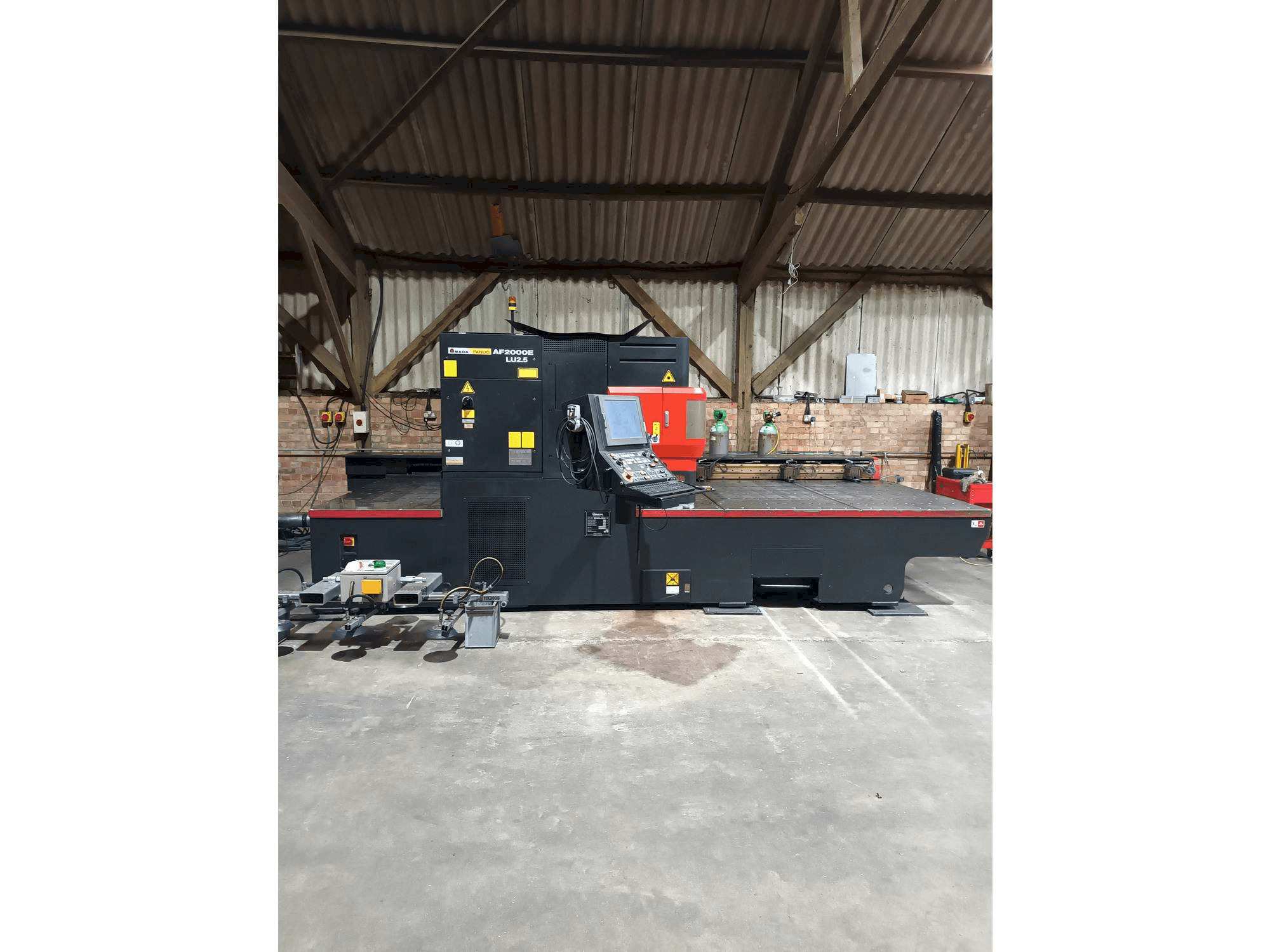 Koneen AMADA LC 2415 alpha 4 NT etunäkymä