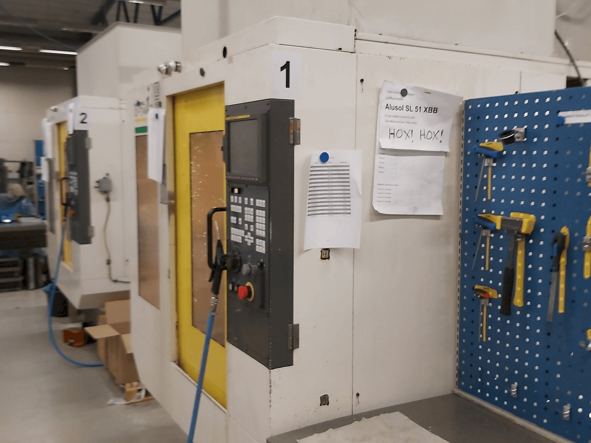 Koneen FANUC Robodrill alfa-T14iA etunäkymä