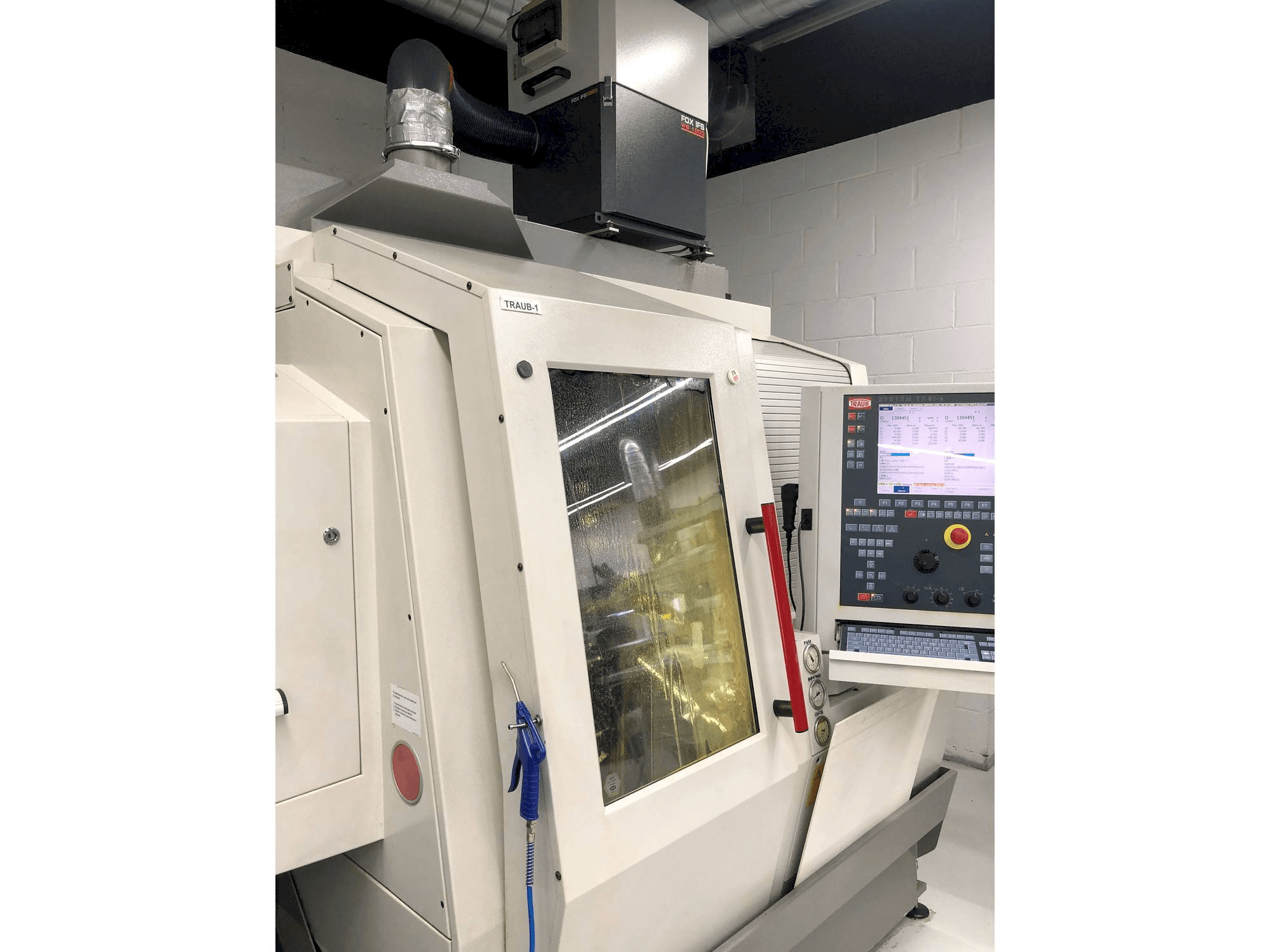 Koneen TRAUB TNL 18 etunäkymä