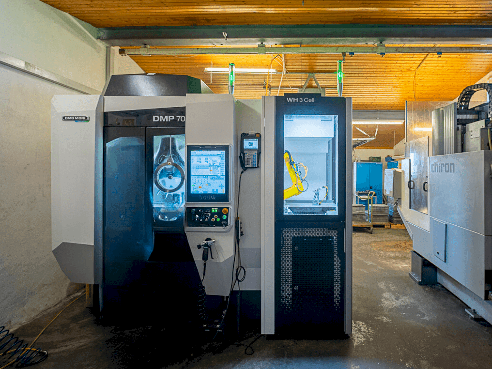 Koneen DMG MORI DMP 70 with WH3 etunäkymä