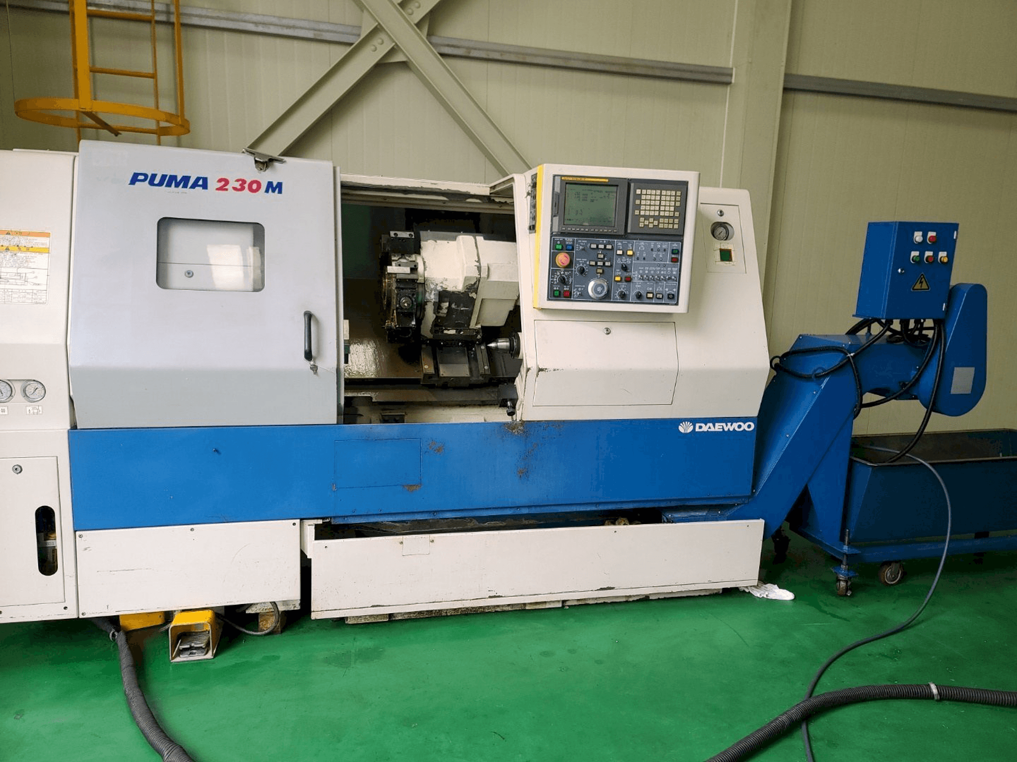 Koneen Doosan PUMA 230MB etunäkymä