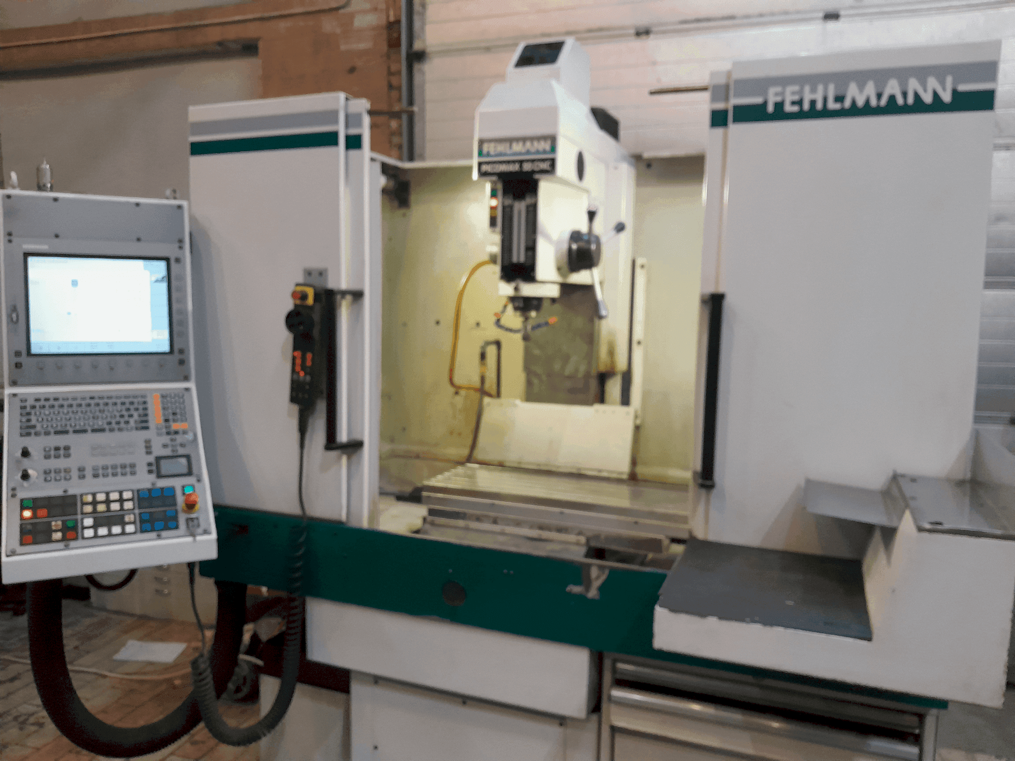 Koneen FEHLMANN PICOMAX 55 CNC 2/3 etunäkymä