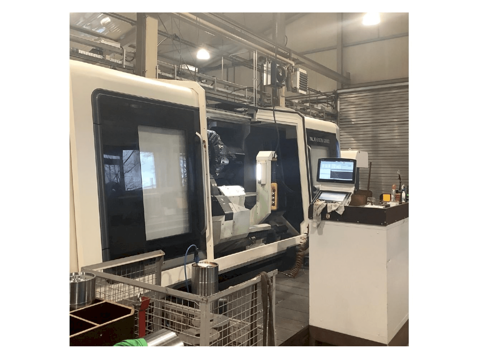 Koneen DMG MORI NLX 6000 | 2000 etunäkymä