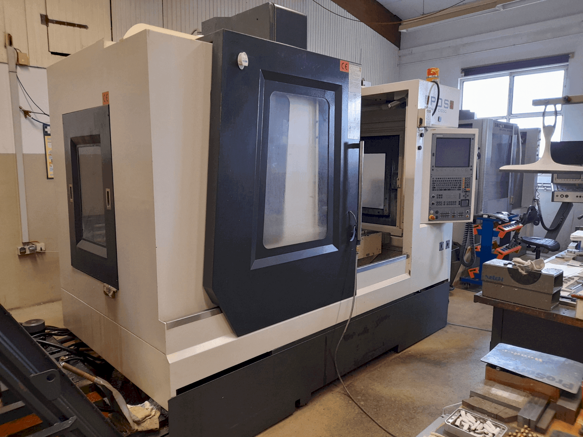 Koneen POSmill C 1050 etunäkymä