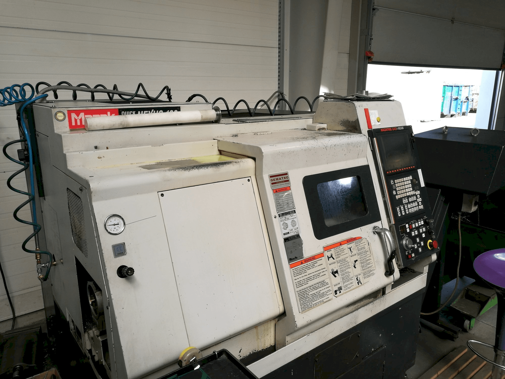 Koneen Mazak QT NEXUS 100 vasemman sivun näkymä